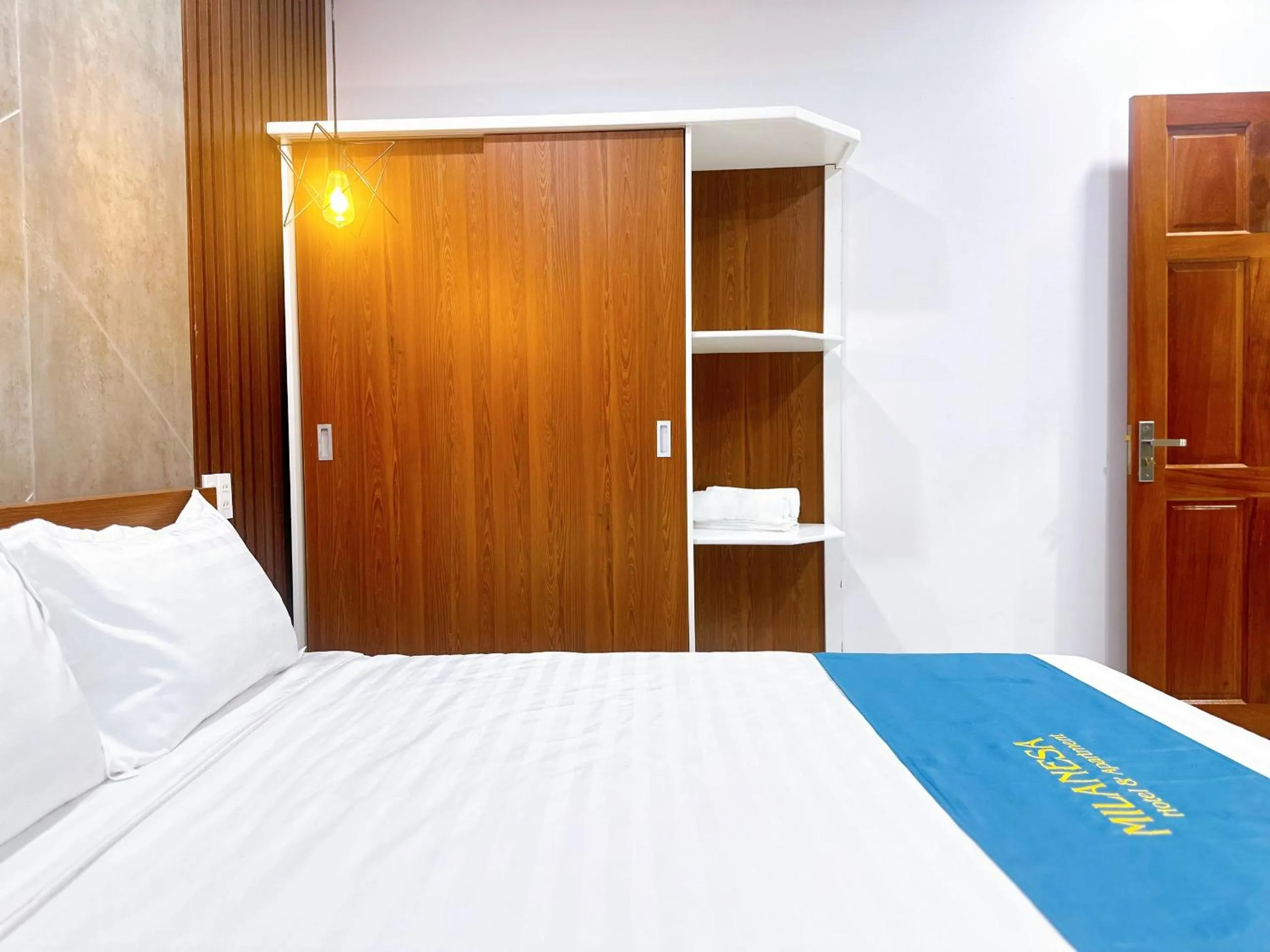 Bed in Milanesa Hotel and Apartment