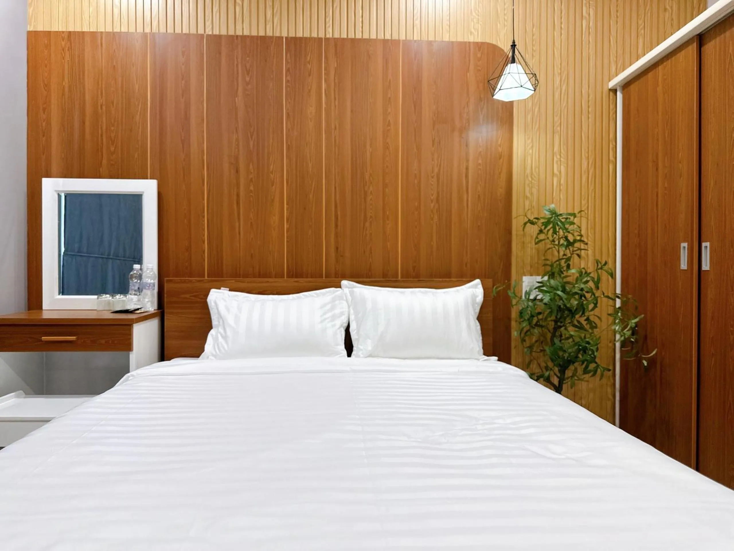 Bed in Milanesa Hotel and Apartment