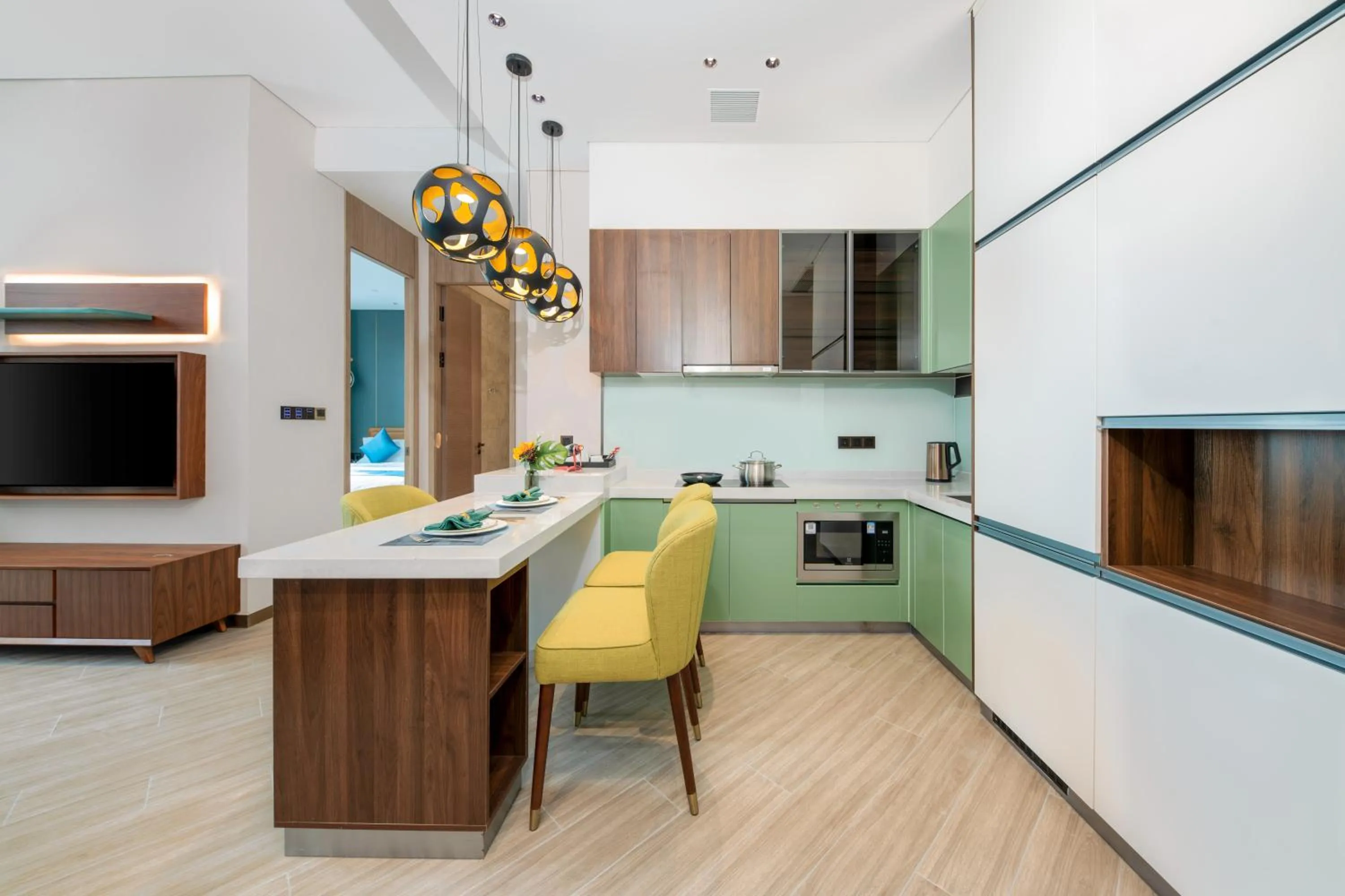 Kitchen or kitchenette in Shan Zhi Ye Serviced Apartment Hotel - Houjie Wanda Plaza Liaoxia Subway Station