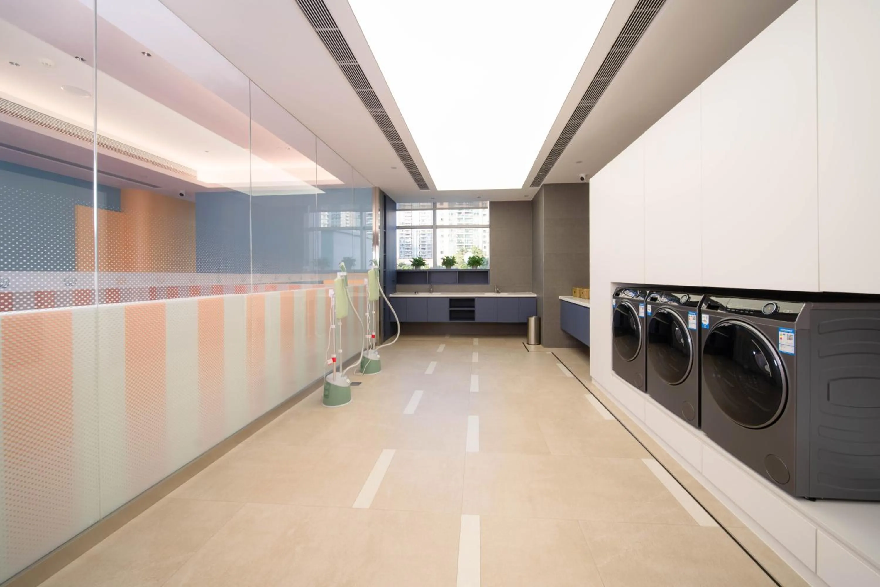 washing machine in Shan Zhi Ye Serviced Apartment Hotel - Houjie Wanda Plaza Liaoxia Subway Station