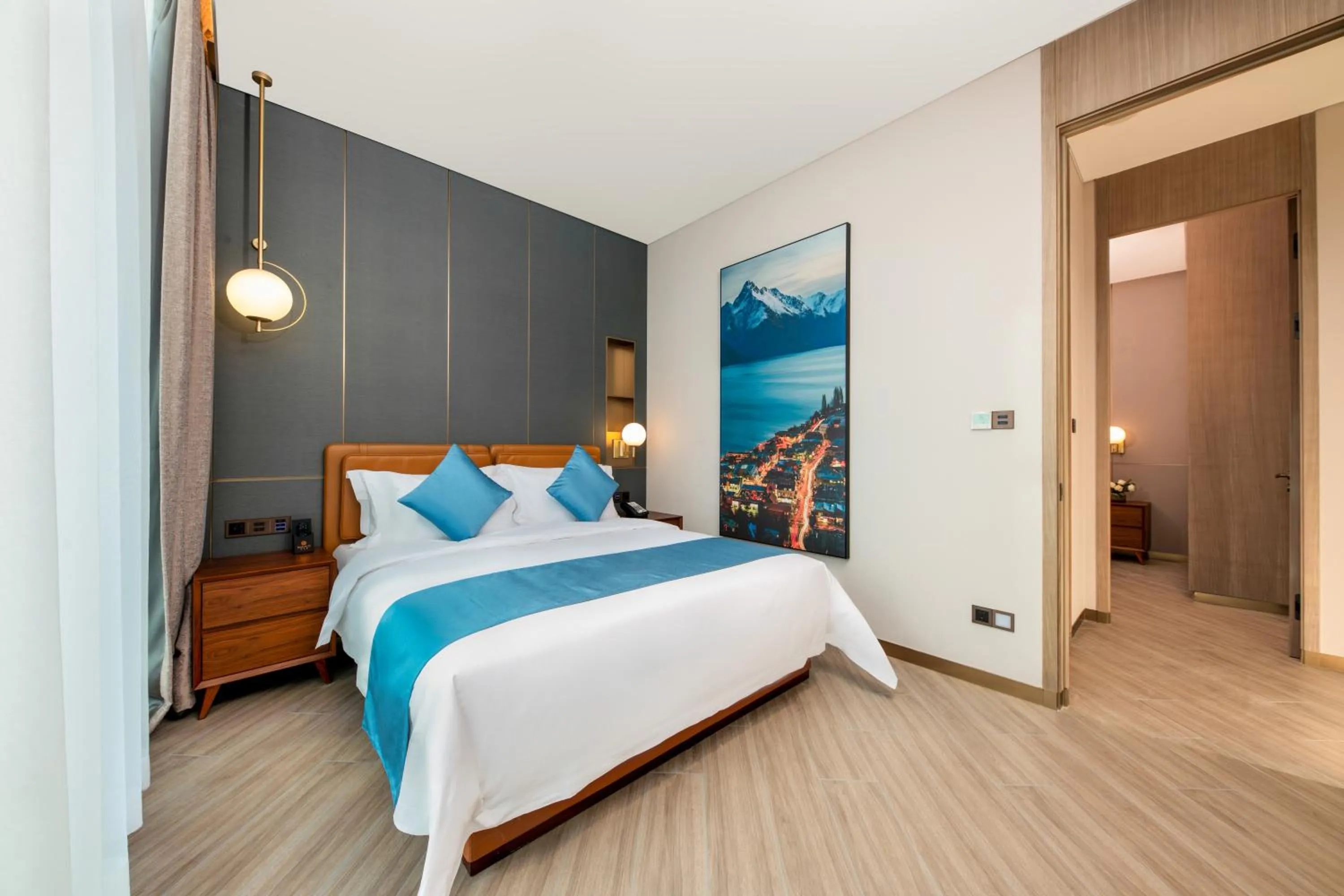 Bed in Shan Zhi Ye Serviced Apartment Hotel - Houjie Wanda Plaza Liaoxia Subway Station