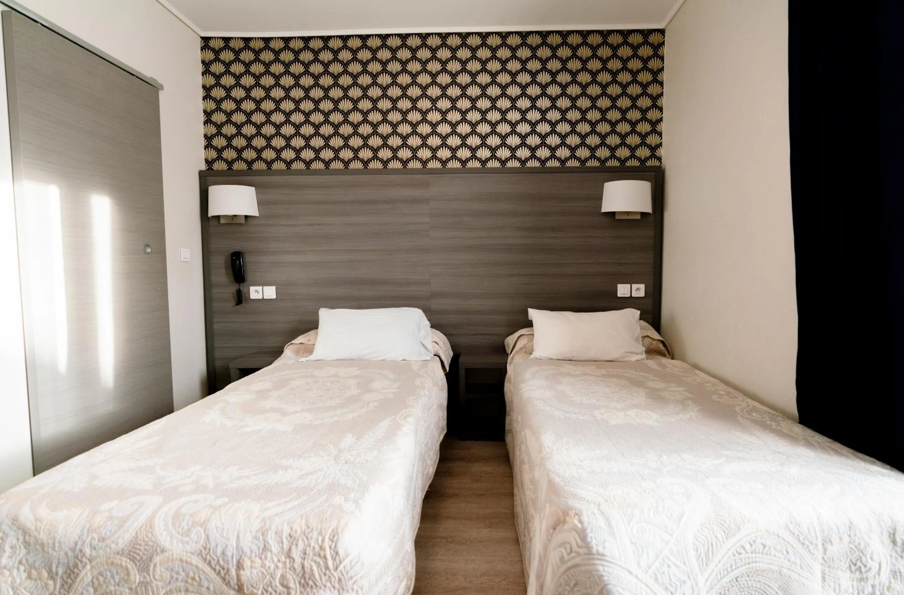 Bed in Hotel Telemaque