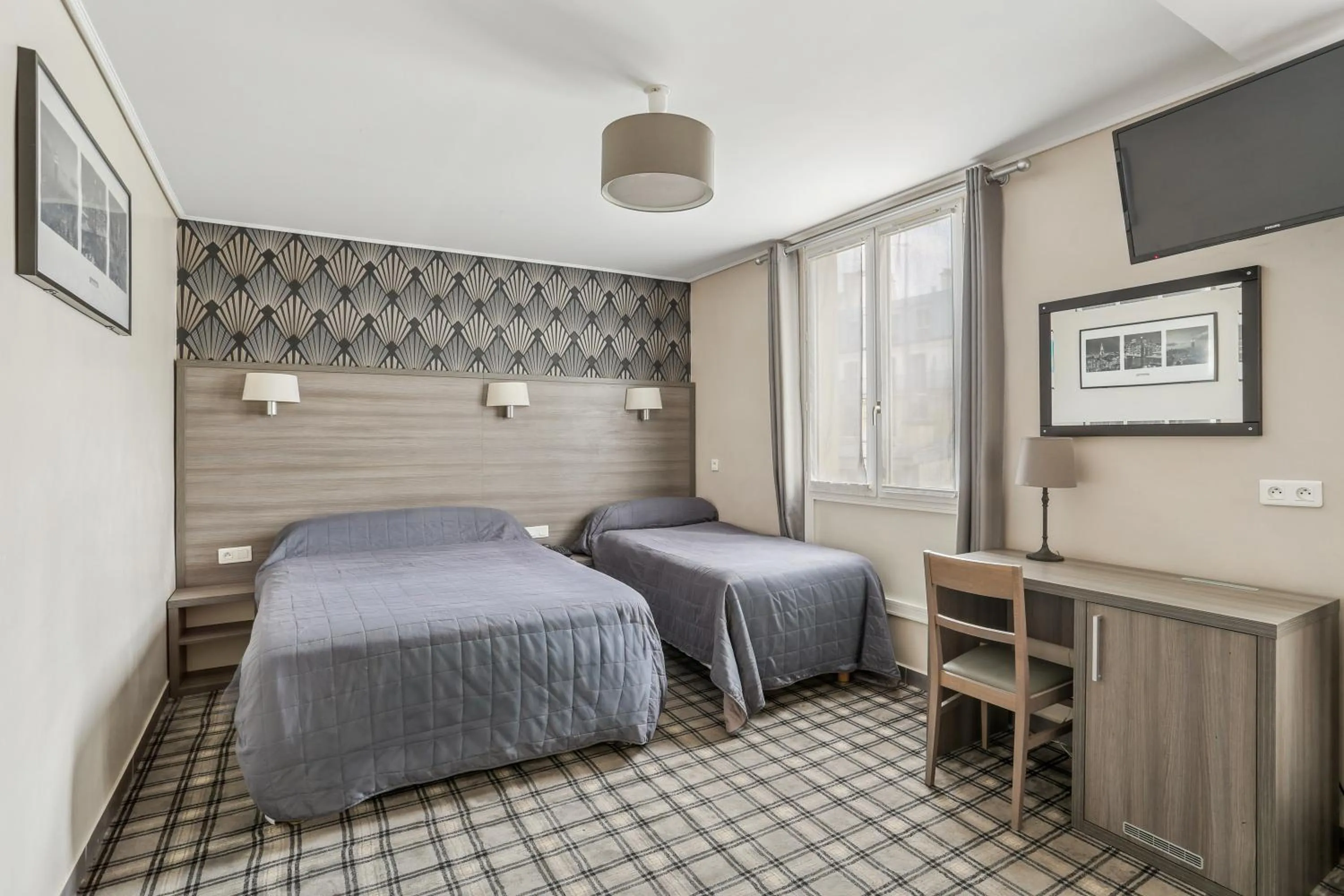 Bed in Hotel Telemaque