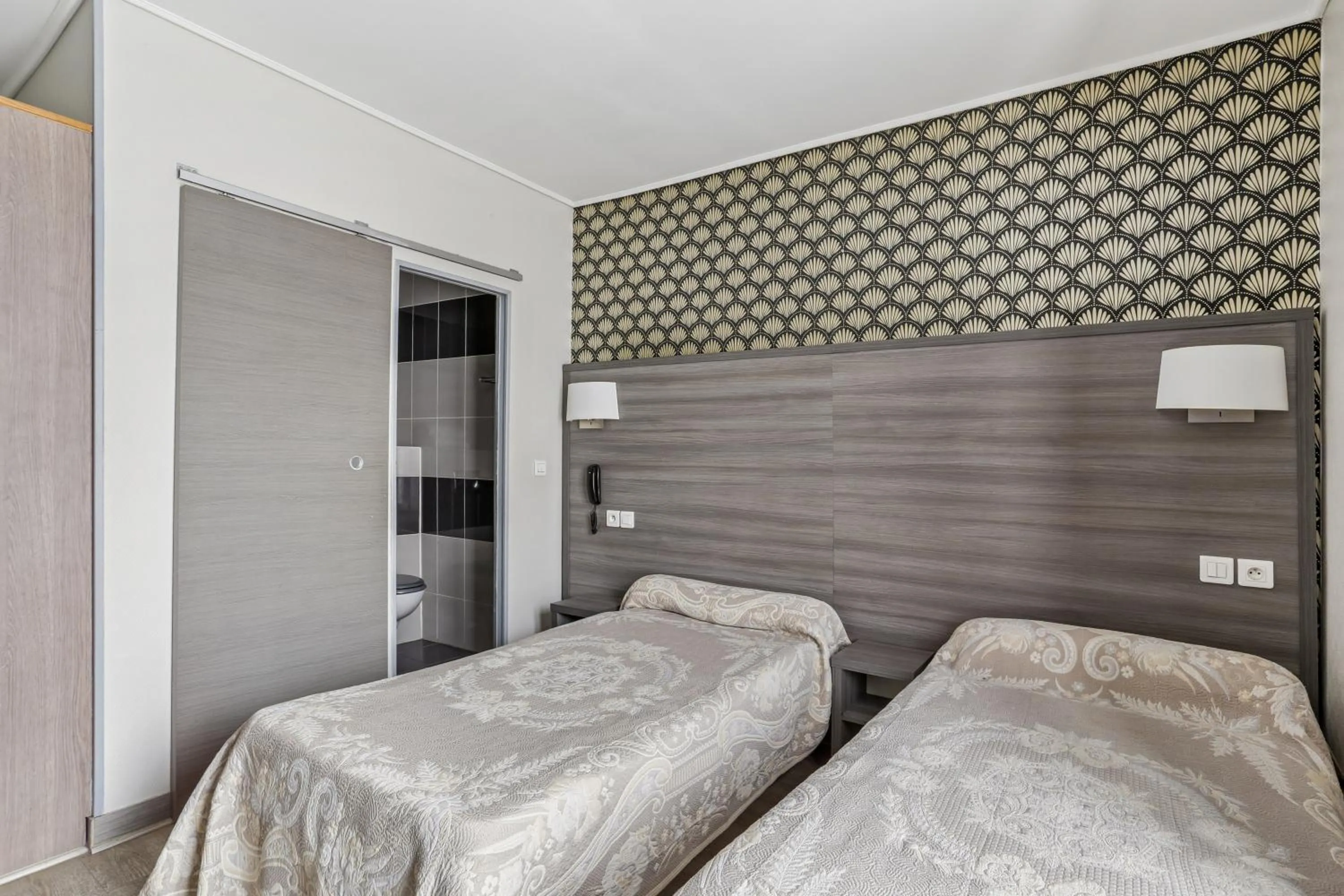 Bed in Hotel Telemaque