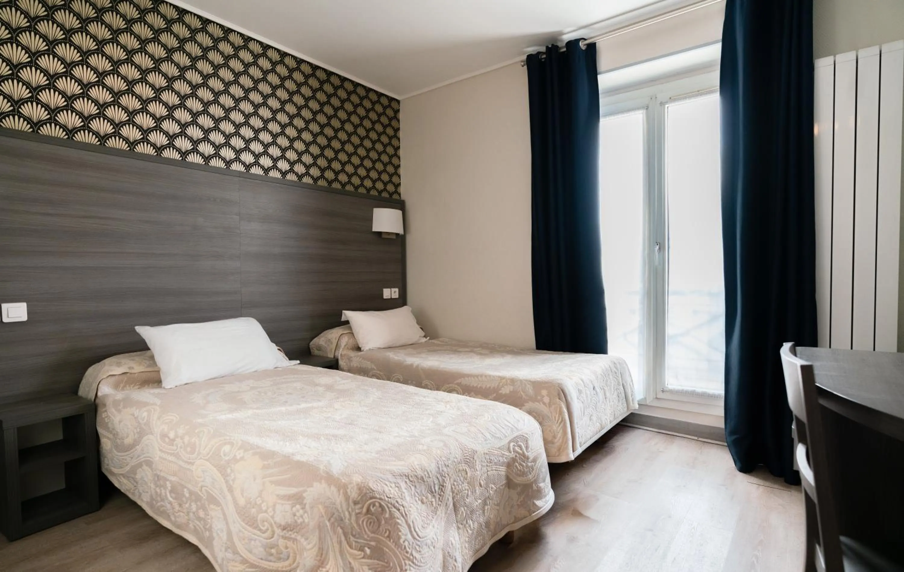 Bed in Hotel Telemaque