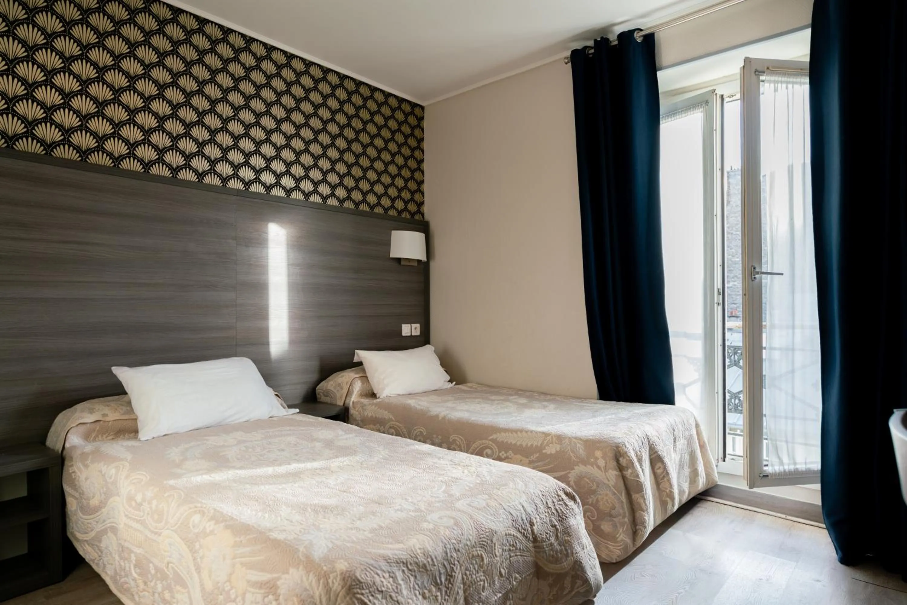 Bed in Hotel Telemaque