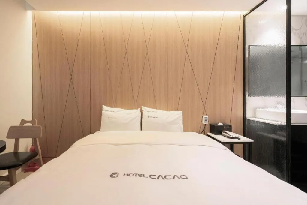 Bed in Cacao Hotel