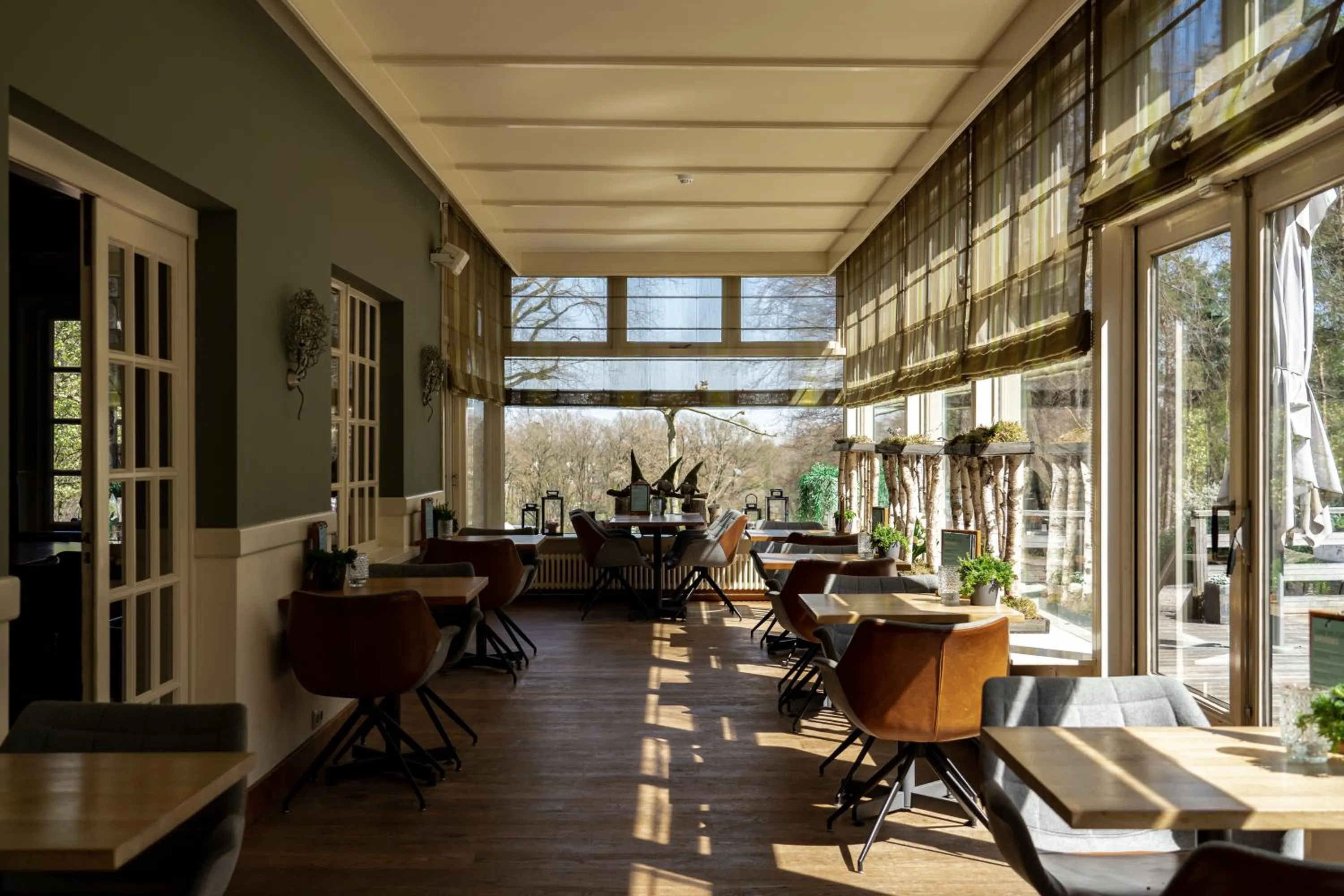 Communal lounge/ TV room in Landgoed De Uitkijk Hellendoorn