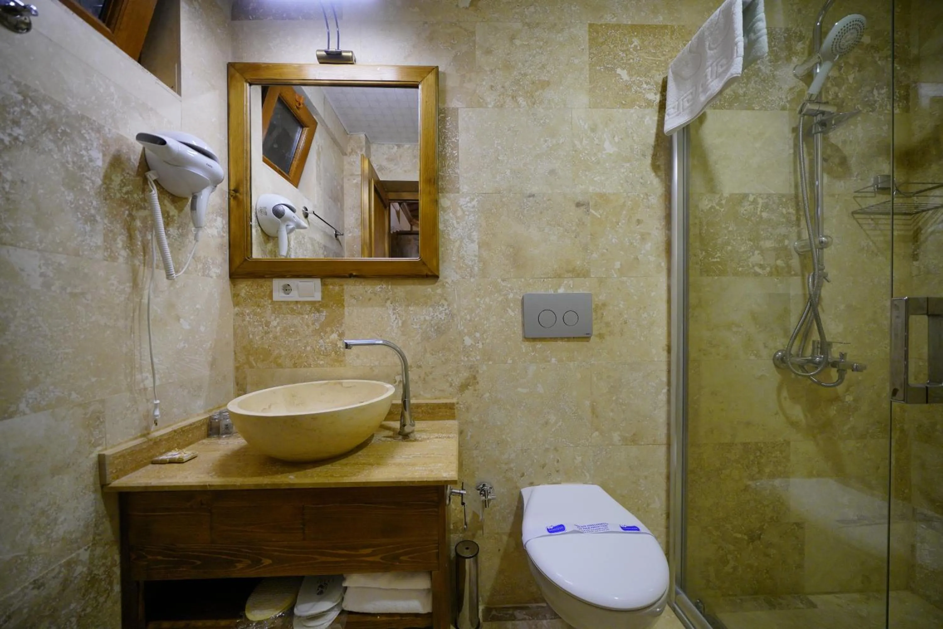 Toilet in Enjoy Stone Hotel