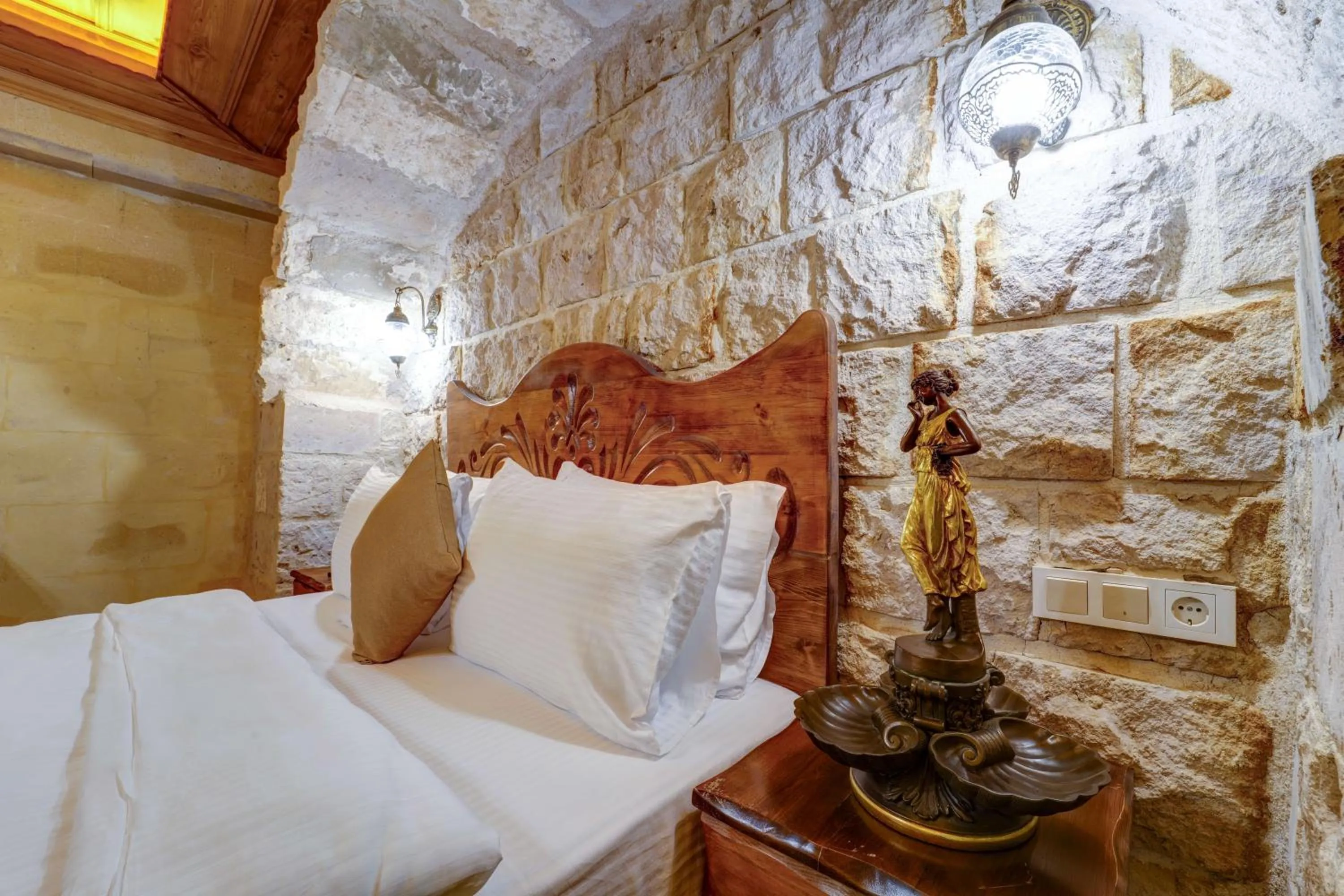 Bed in Enjoy Stone Hotel