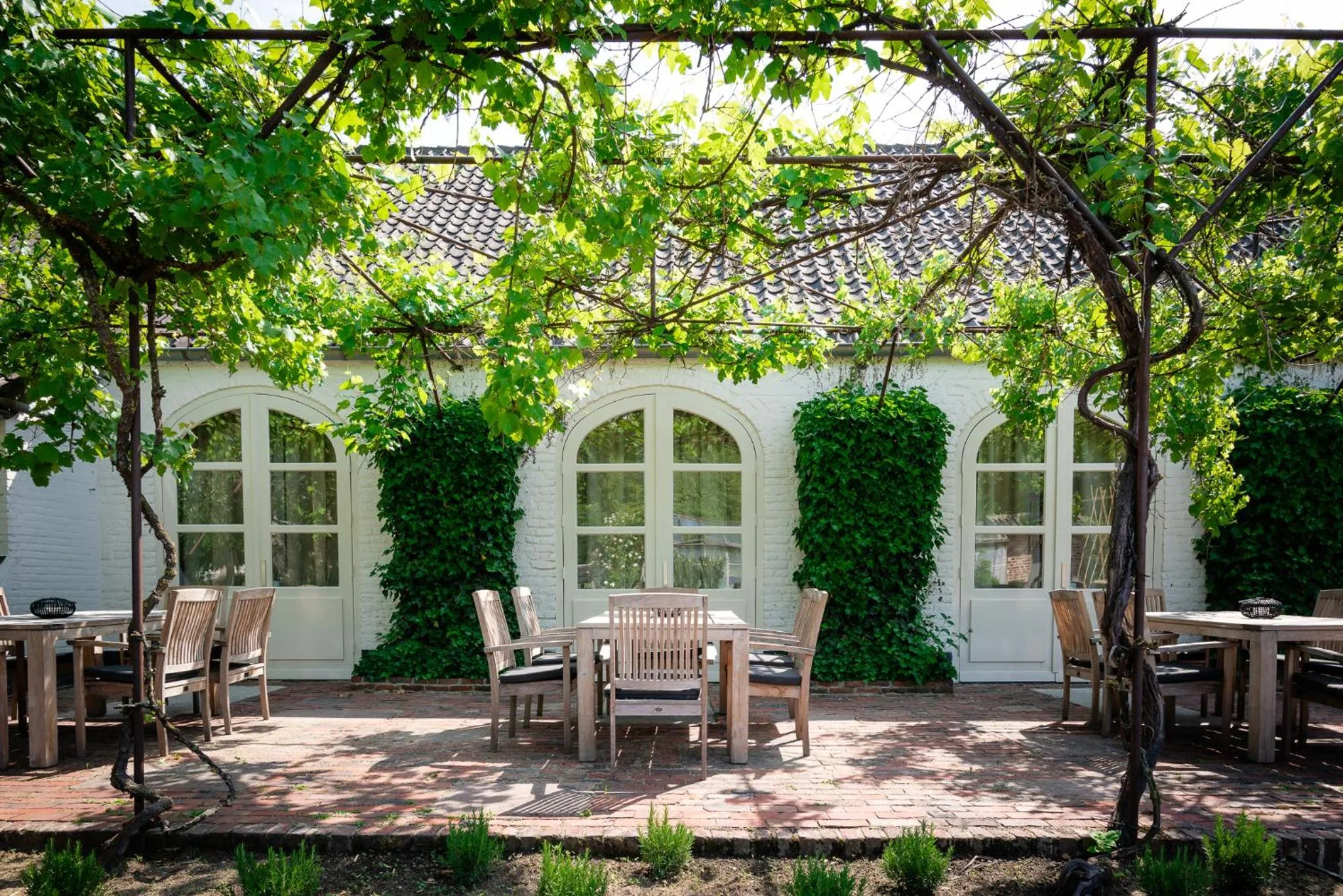 Patio in Fletcher Hotel Château De Raay