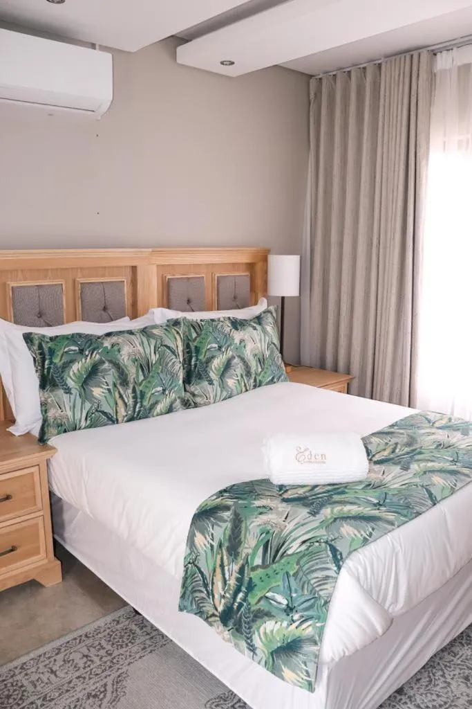 Bed in EDEN BOUTIQUE HOTEL