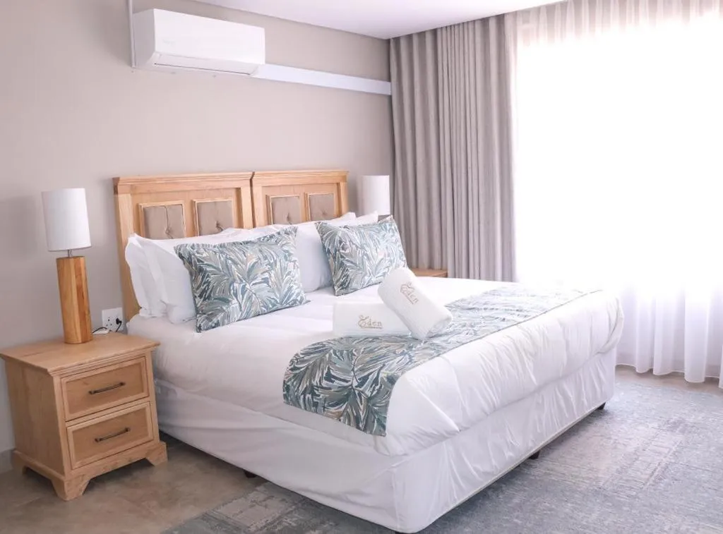 Bed in EDEN BOUTIQUE HOTEL