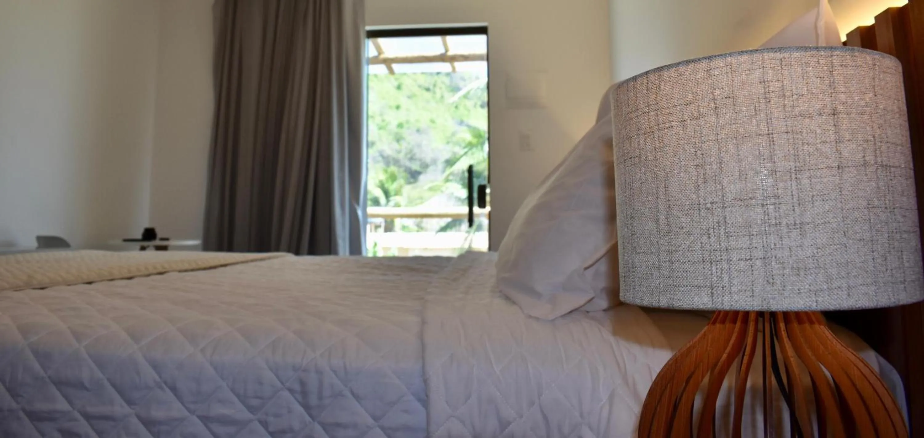 Bed in POUSADA AMAR NORONHA