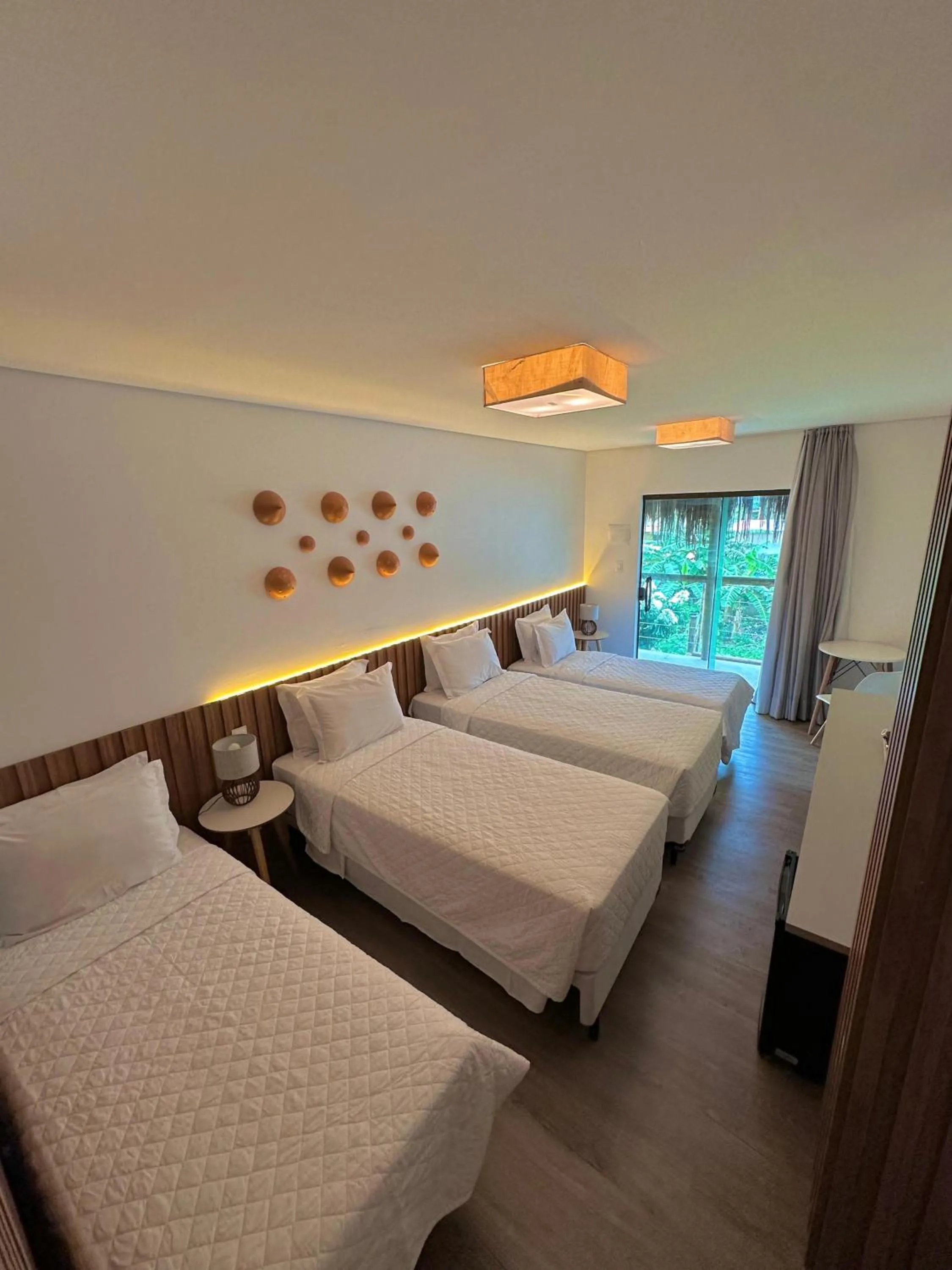 Photo of the whole room, Bed in POUSADA AMAR NORONHA