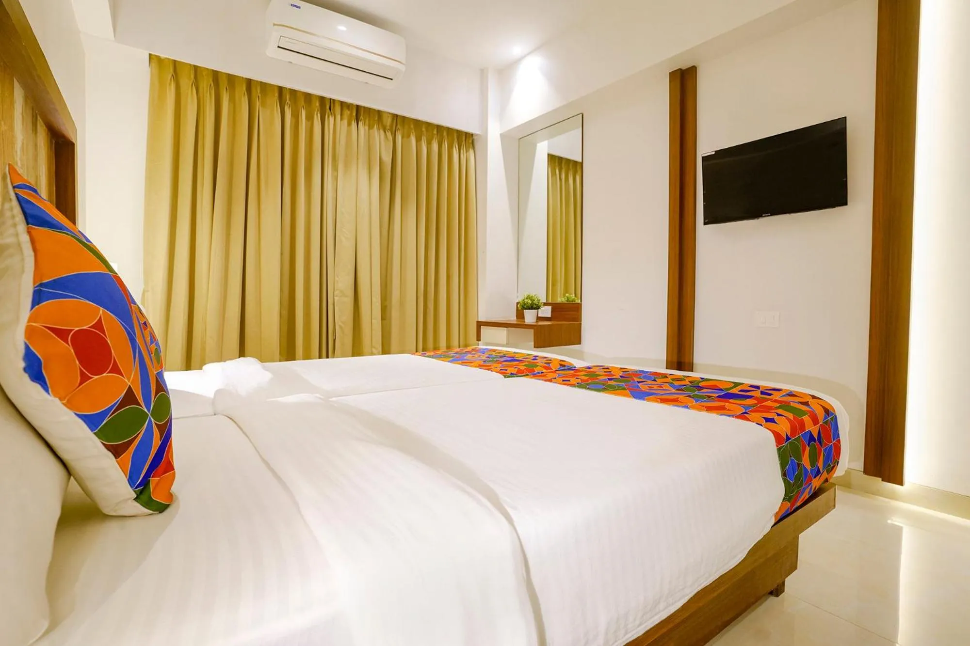 Bed in FabHotel Prime Shubham Comforts