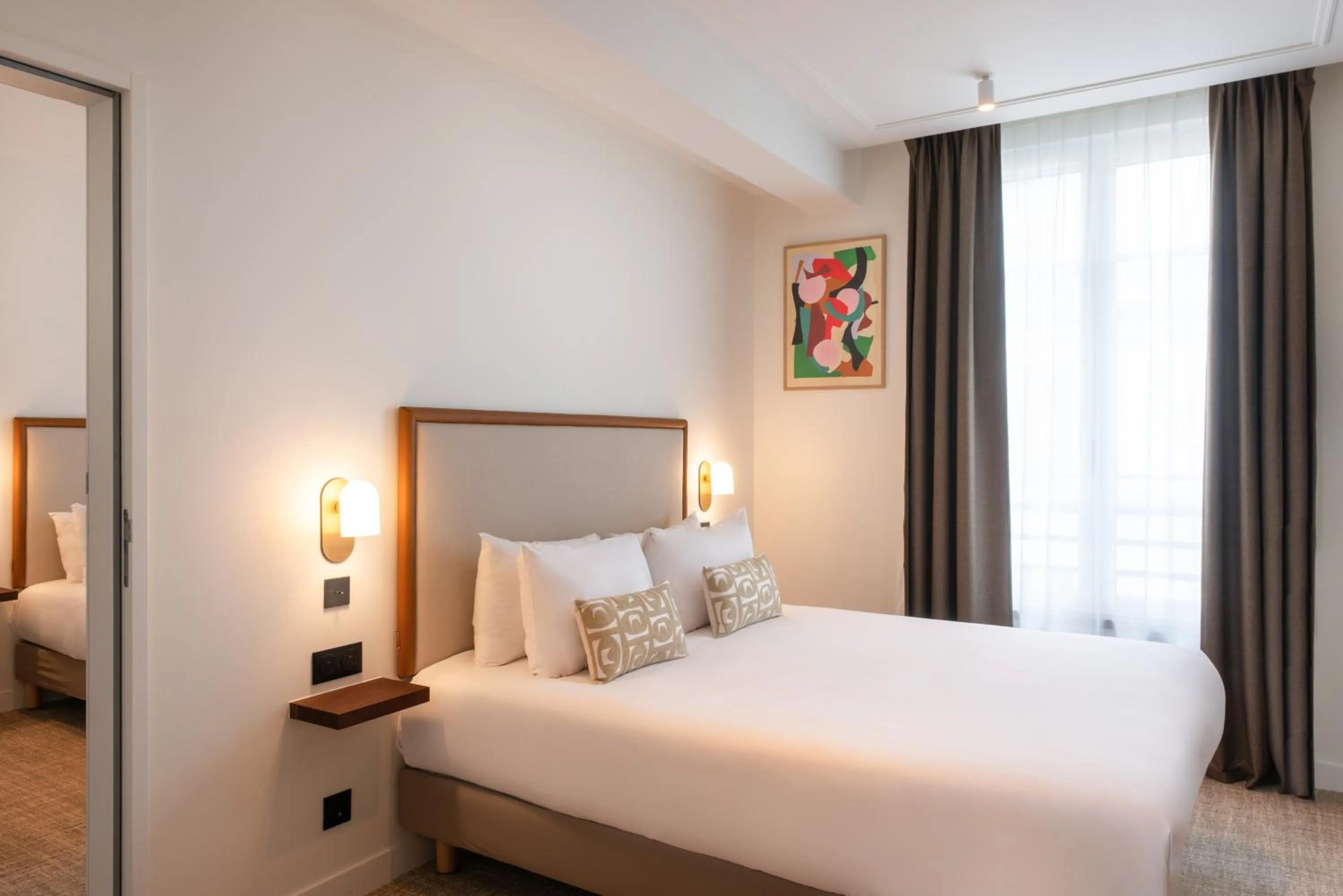 Bed in Le Lampika Hôtel