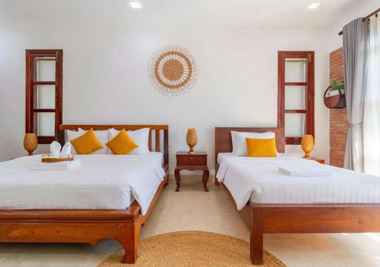 Bed in Angkor Eden Boutique Hotel