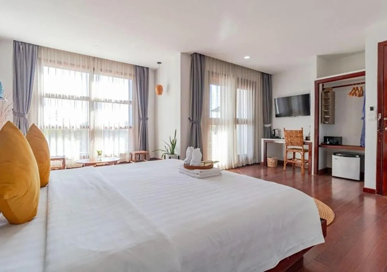 Bed in Angkor Eden Boutique Hotel