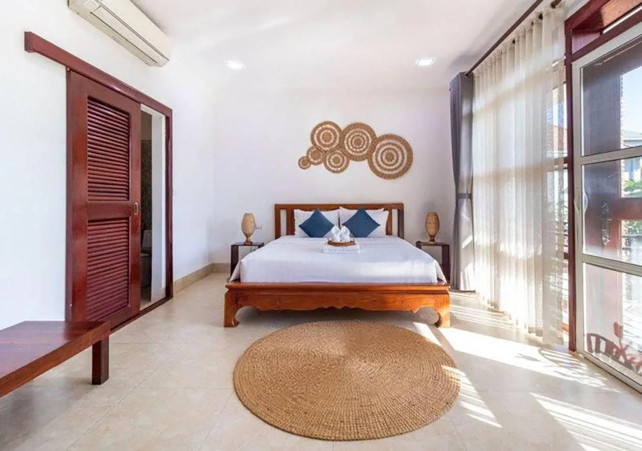 Bed in Angkor Eden Boutique Hotel