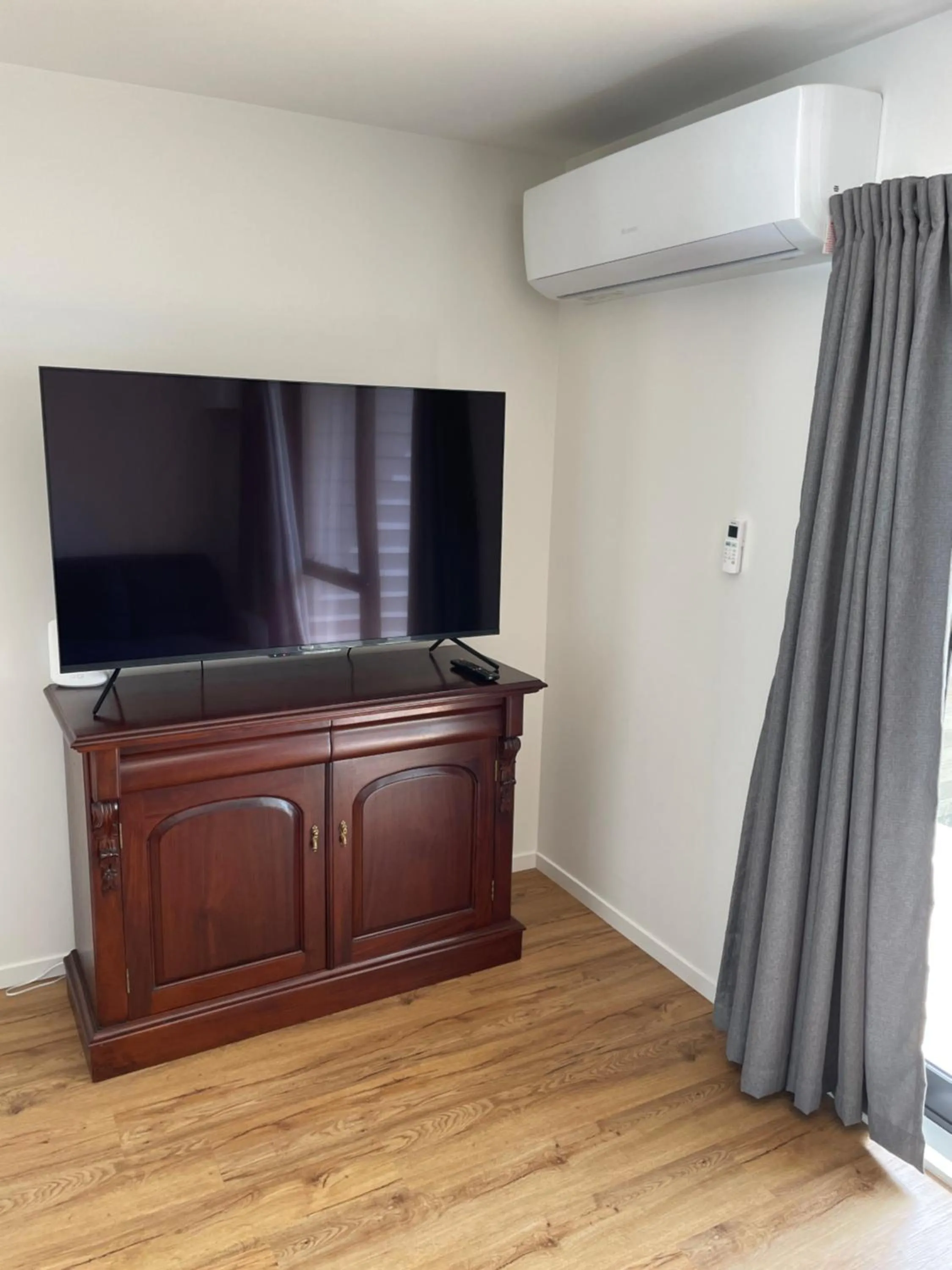 TV and multimedia in Modern Home by the Reserve