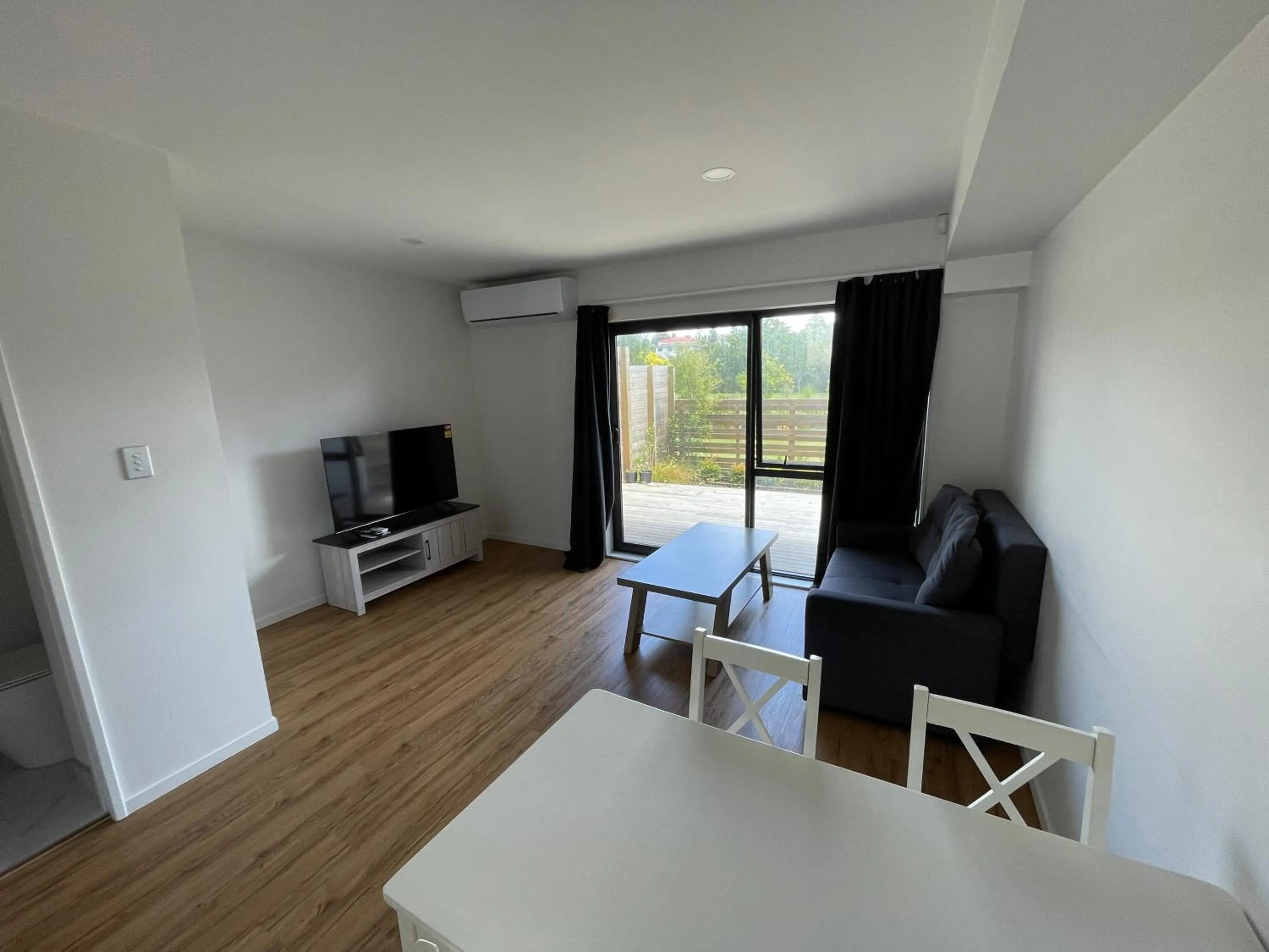 Living room in Modern Home by the Reserve