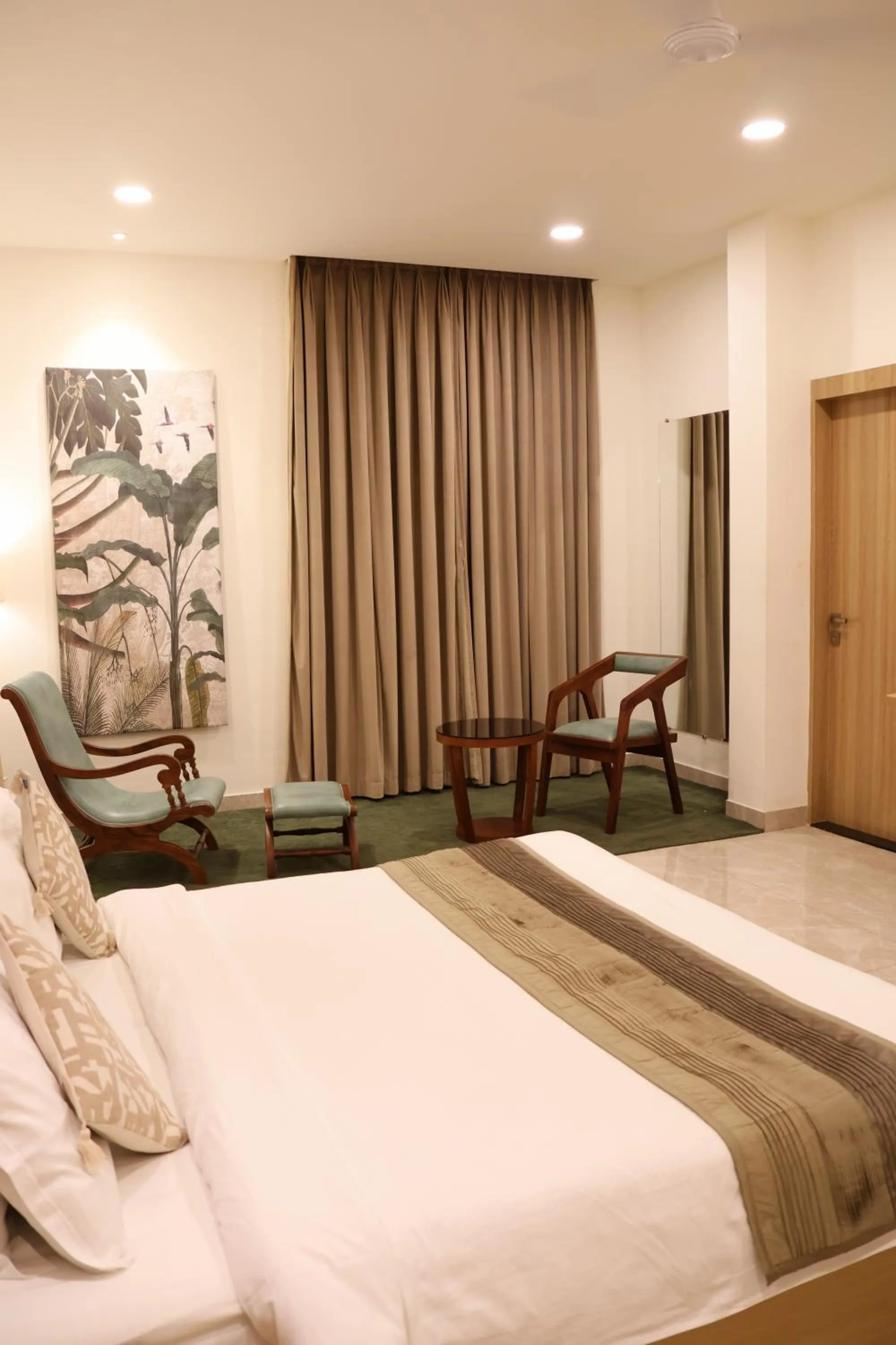 Seating area, Bed in Labels Hotel