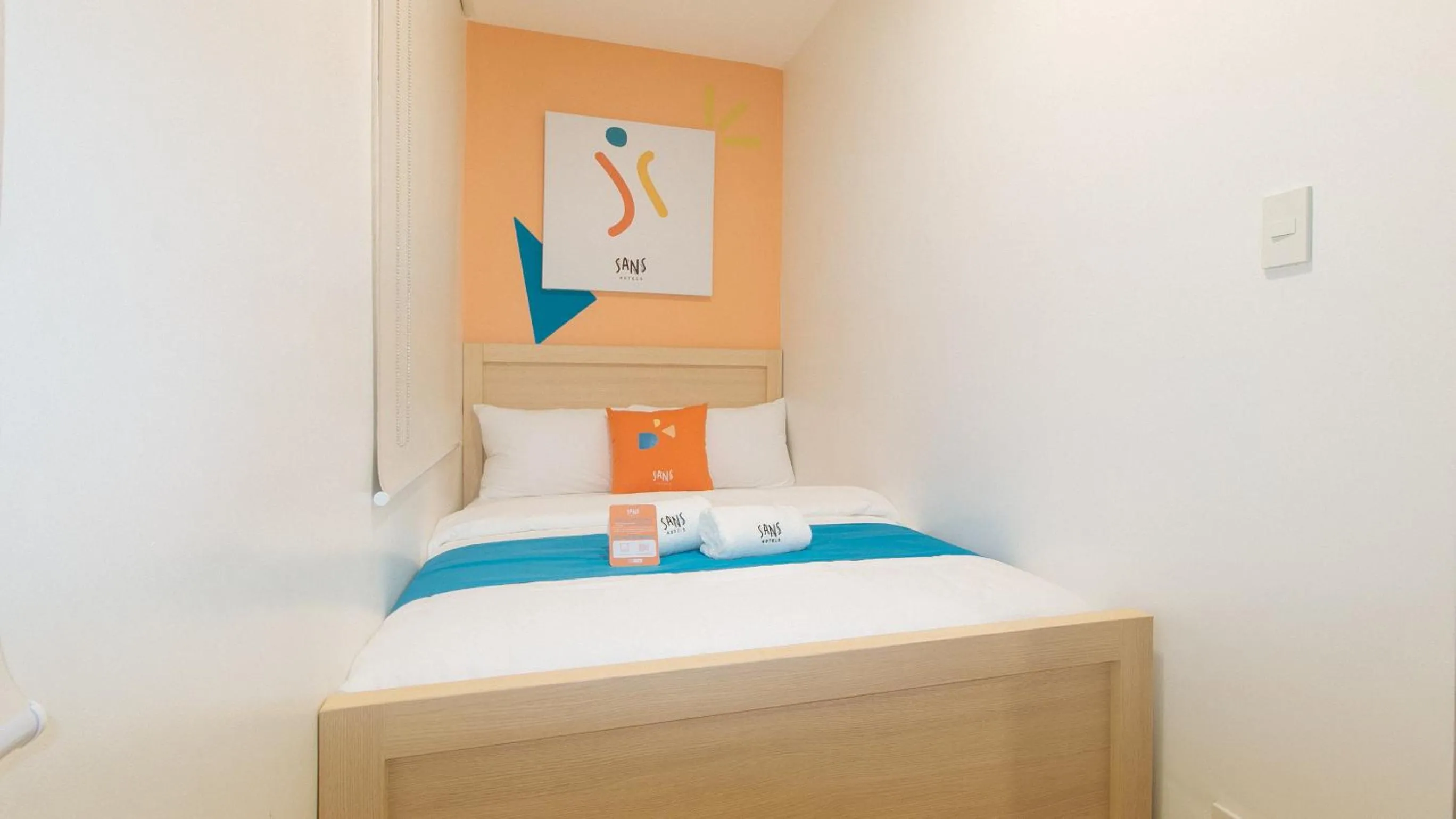 Bed in Sans Hotel at One JD Place Makati by RedDoorz