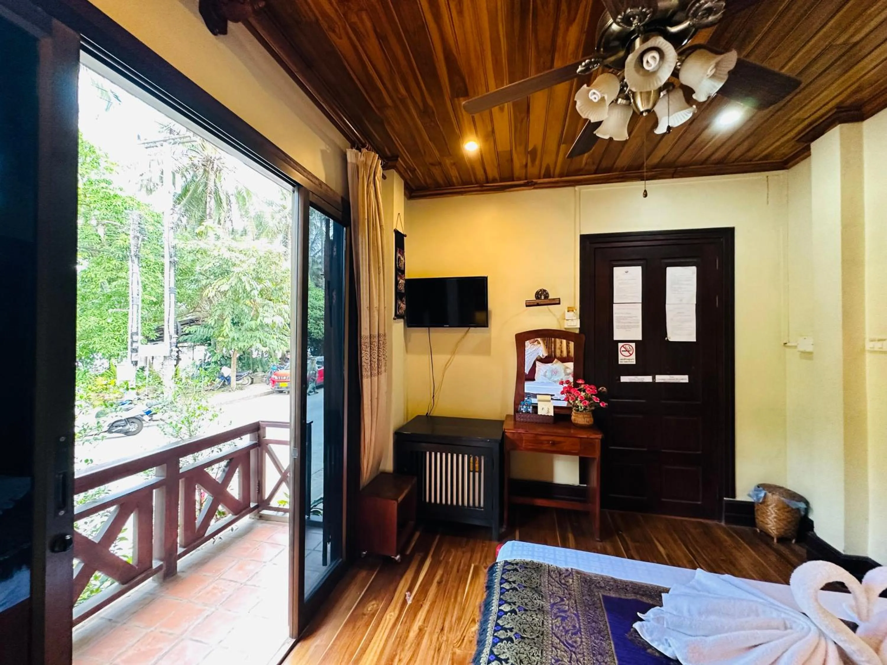 Communal lounge/ TV room in Anisa Mekong Riverside Villa