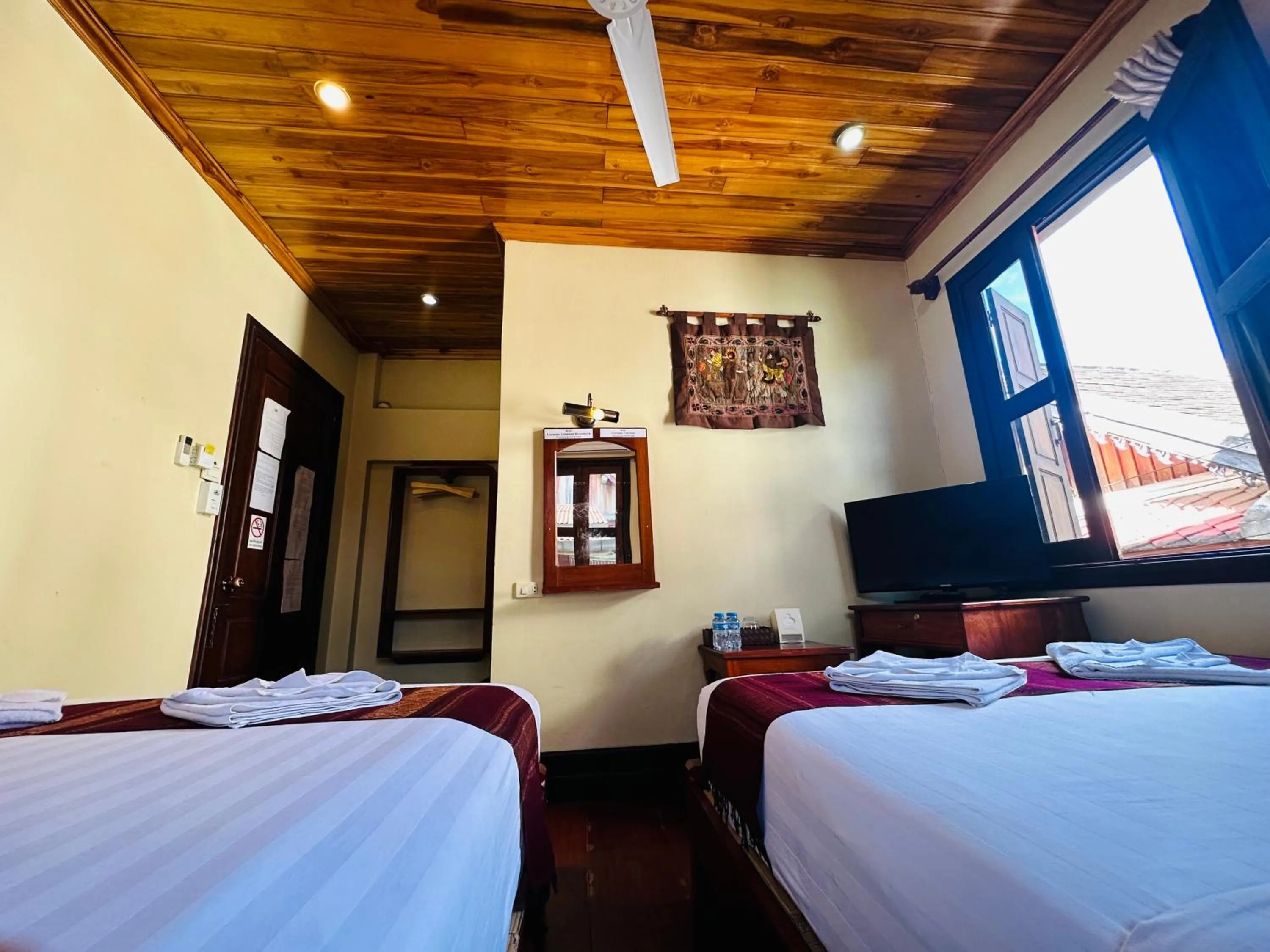 Bed in Anisa Mekong Riverside Villa