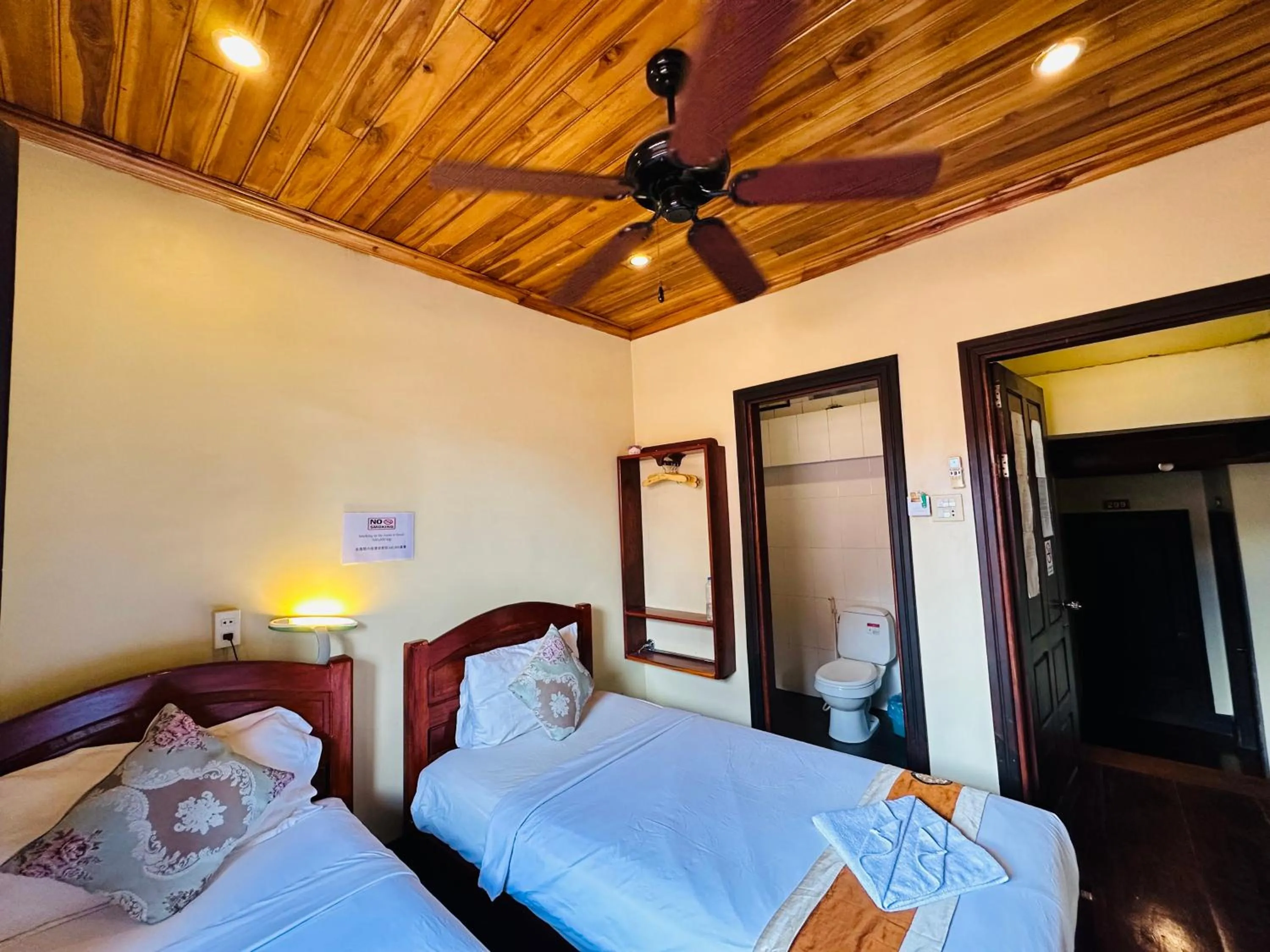 Bed in Anisa Mekong Riverside Villa