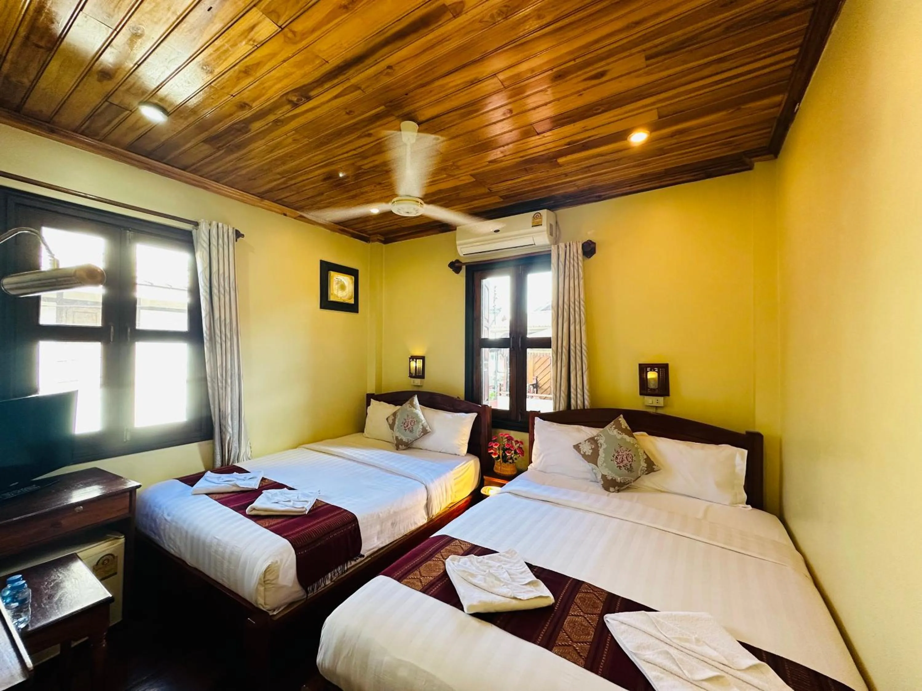 Bed in Anisa Mekong Riverside Villa