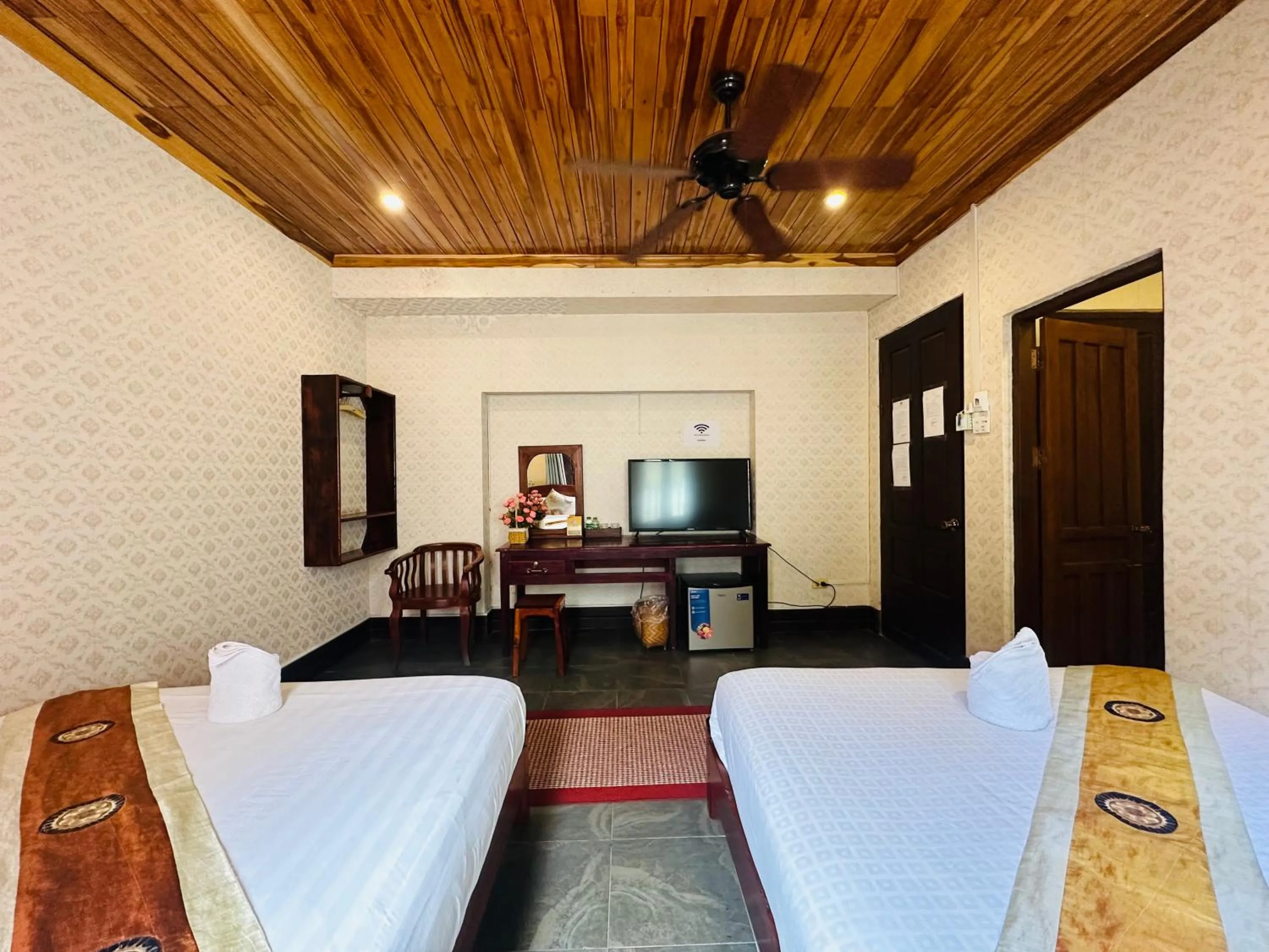 Bed in Anisa Mekong Riverside Villa