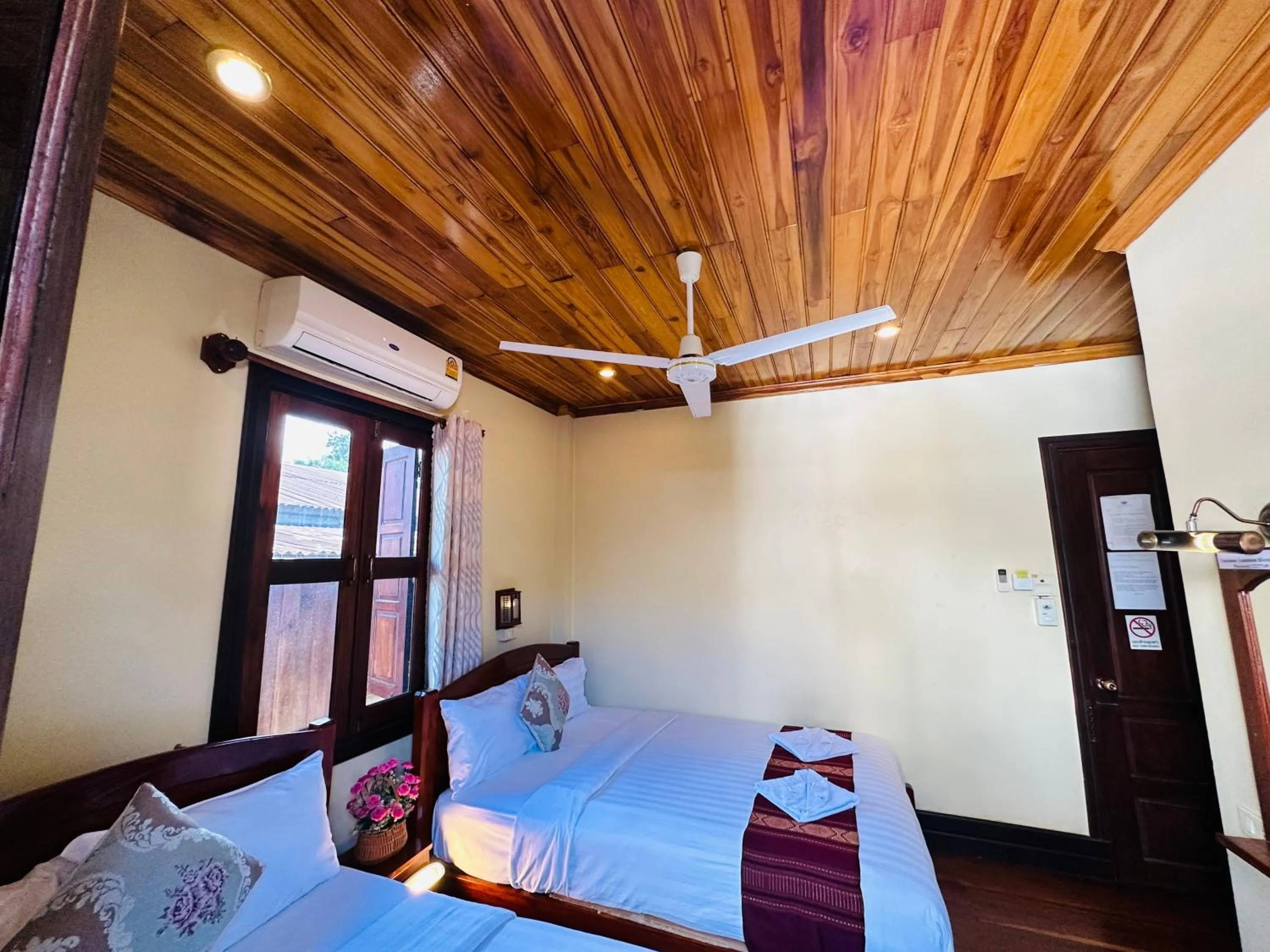 Bed in Anisa Mekong Riverside Villa