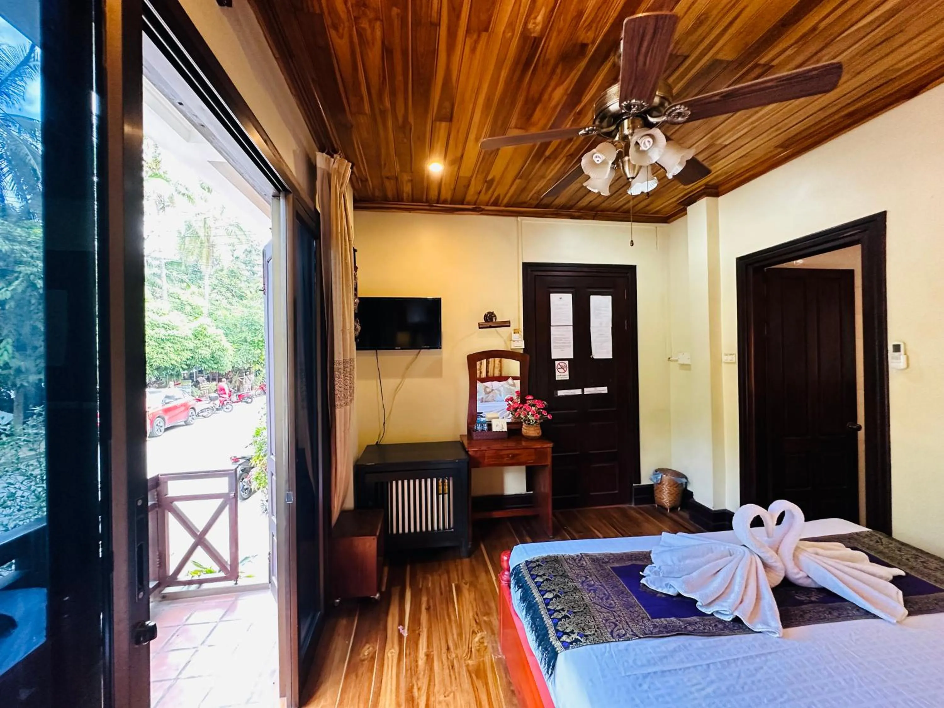 Communal lounge/ TV room, Bed in Anisa Mekong Riverside Villa