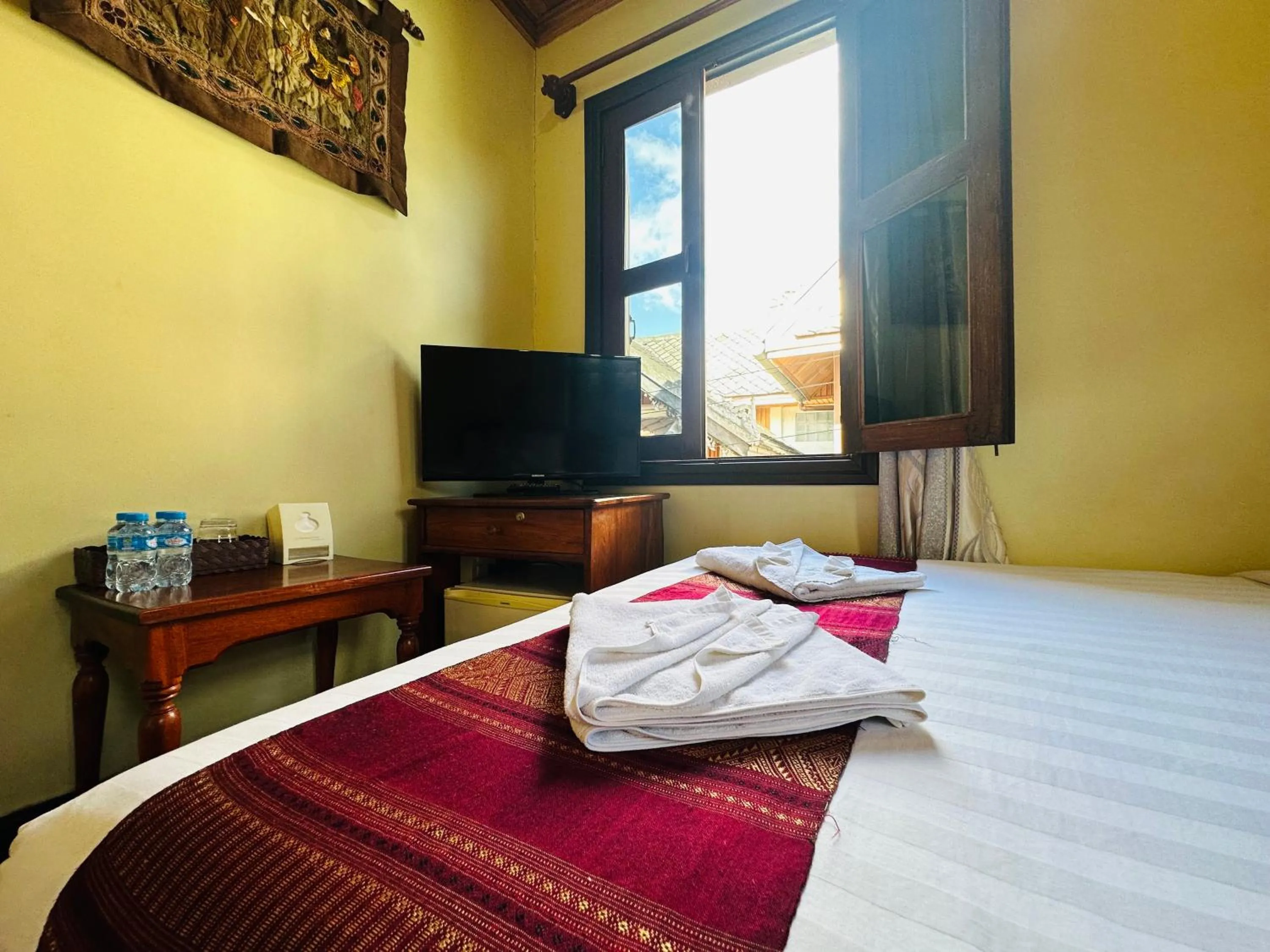 Communal lounge/ TV room, Bed in Anisa Mekong Riverside Villa