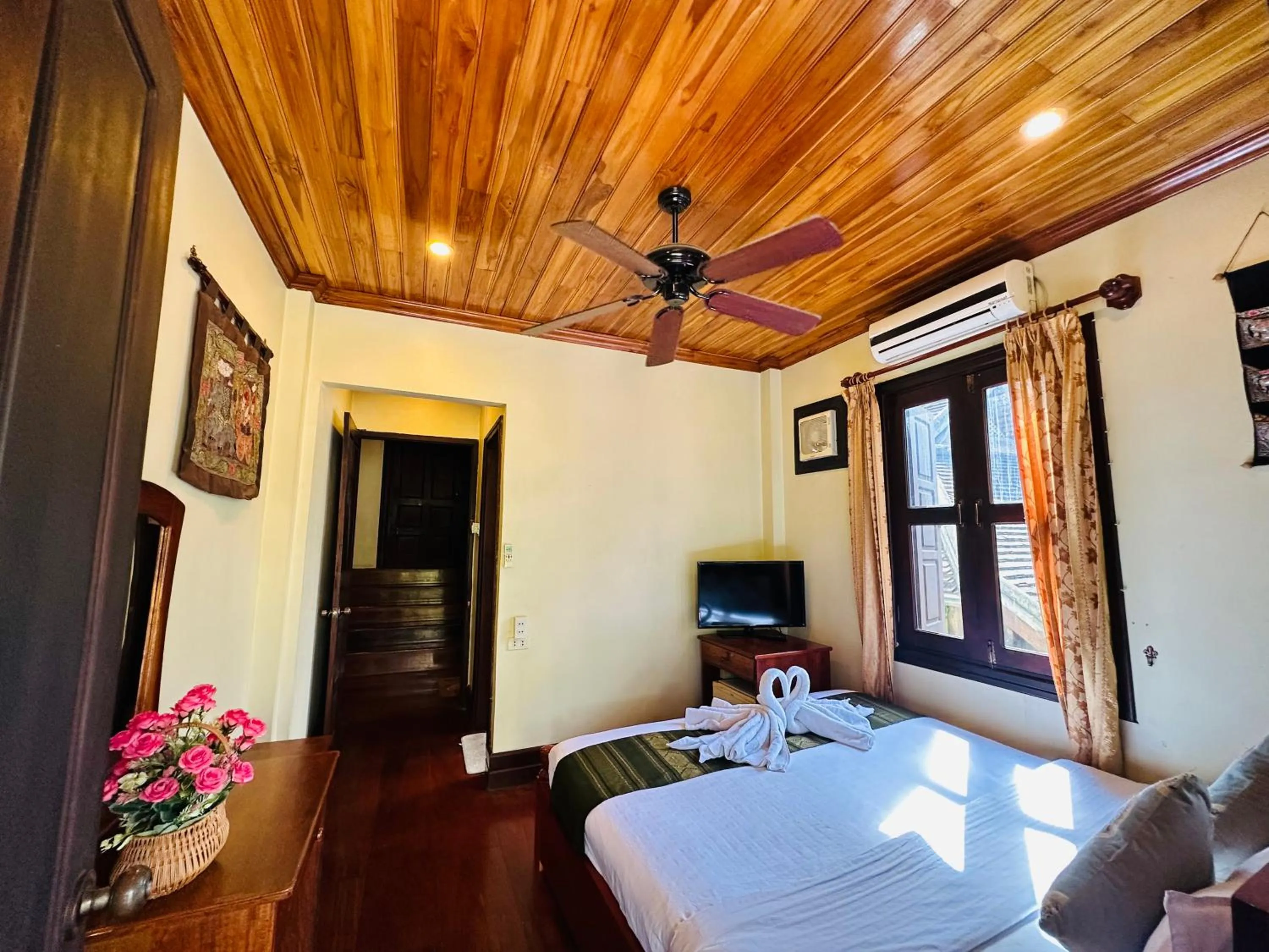 Communal lounge/ TV room in Anisa Mekong Riverside Villa