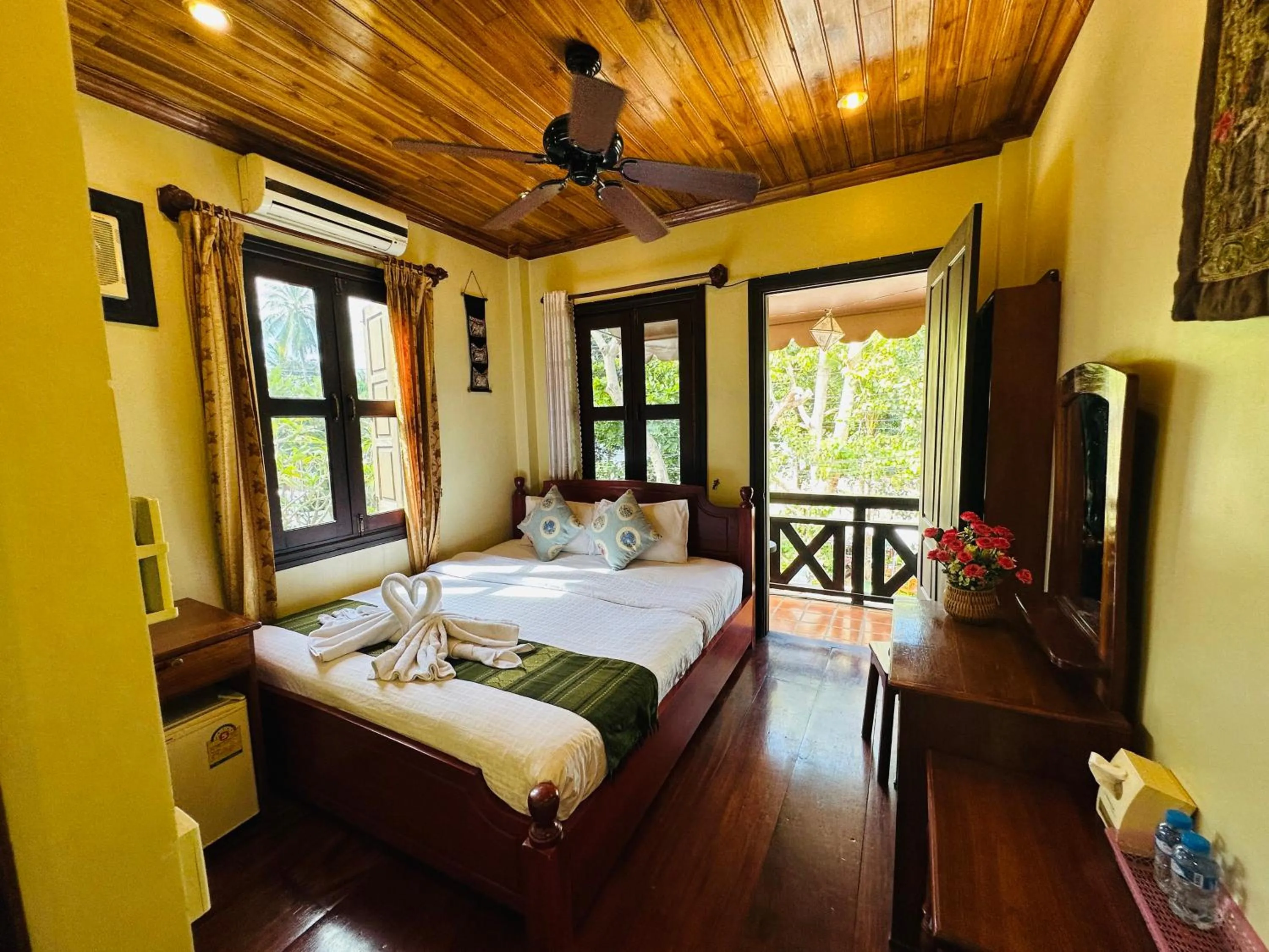 Bed in Anisa Mekong Riverside Villa