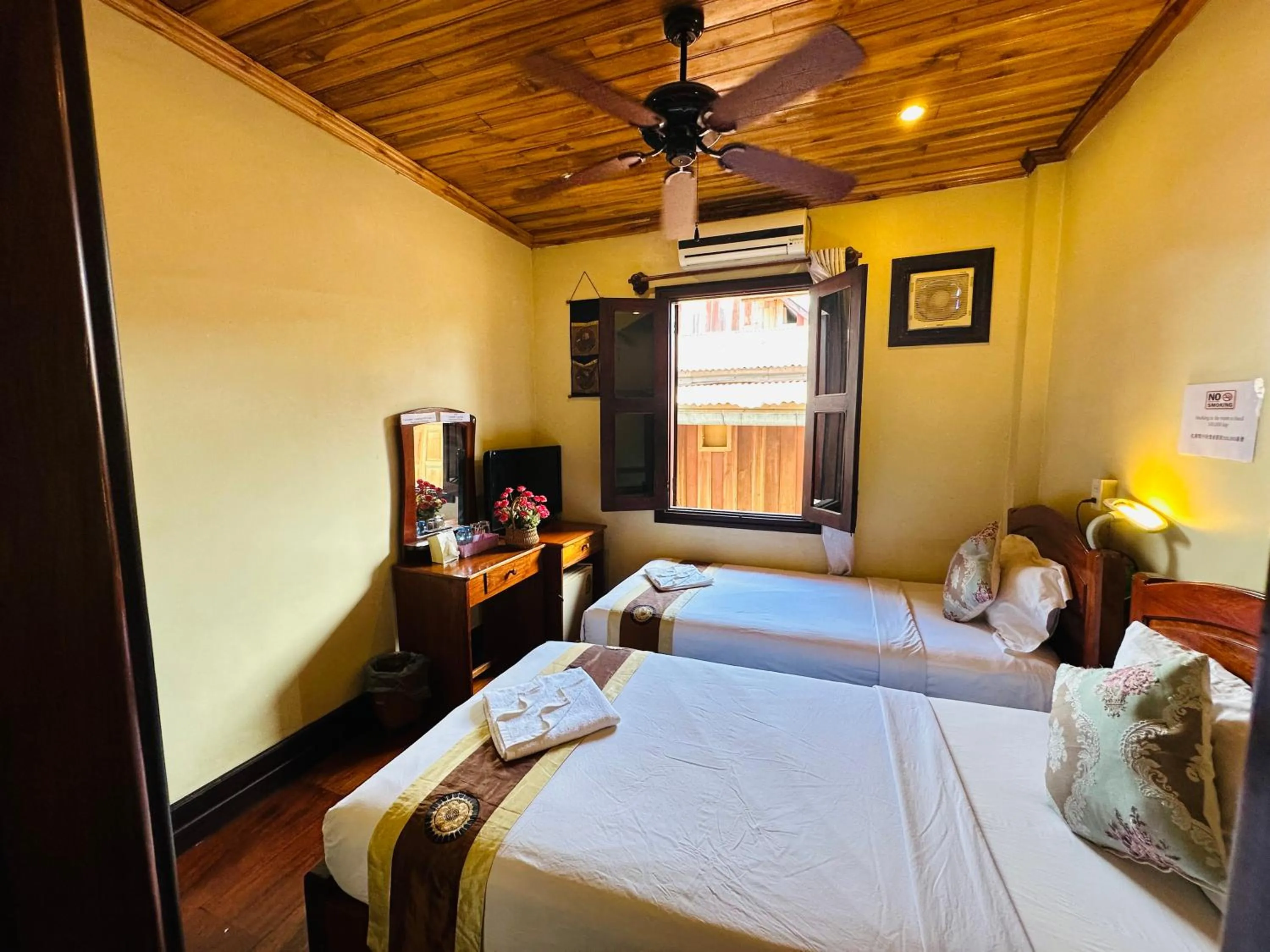 Bed in Anisa Mekong Riverside Villa