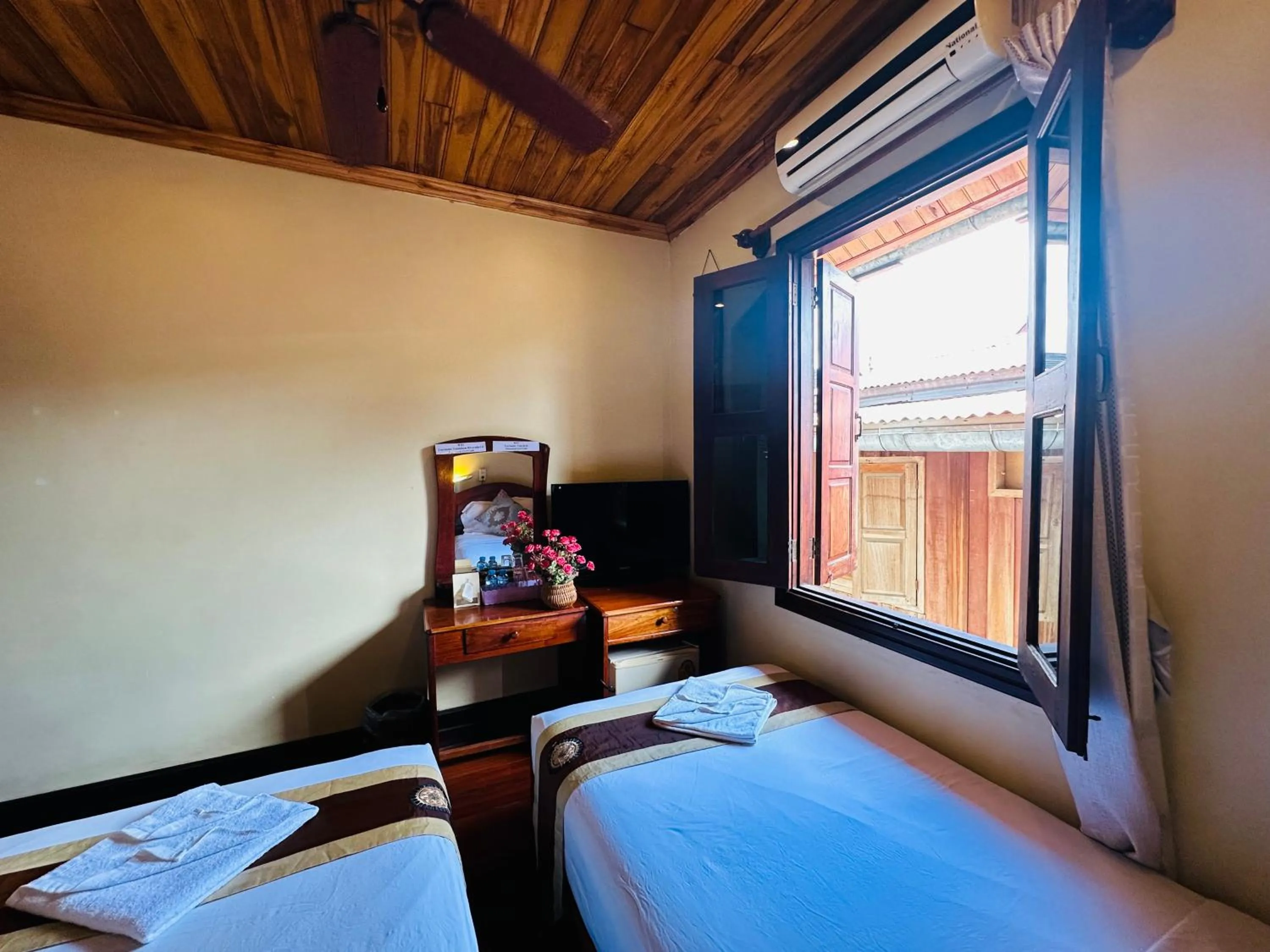 Bed in Anisa Mekong Riverside Villa