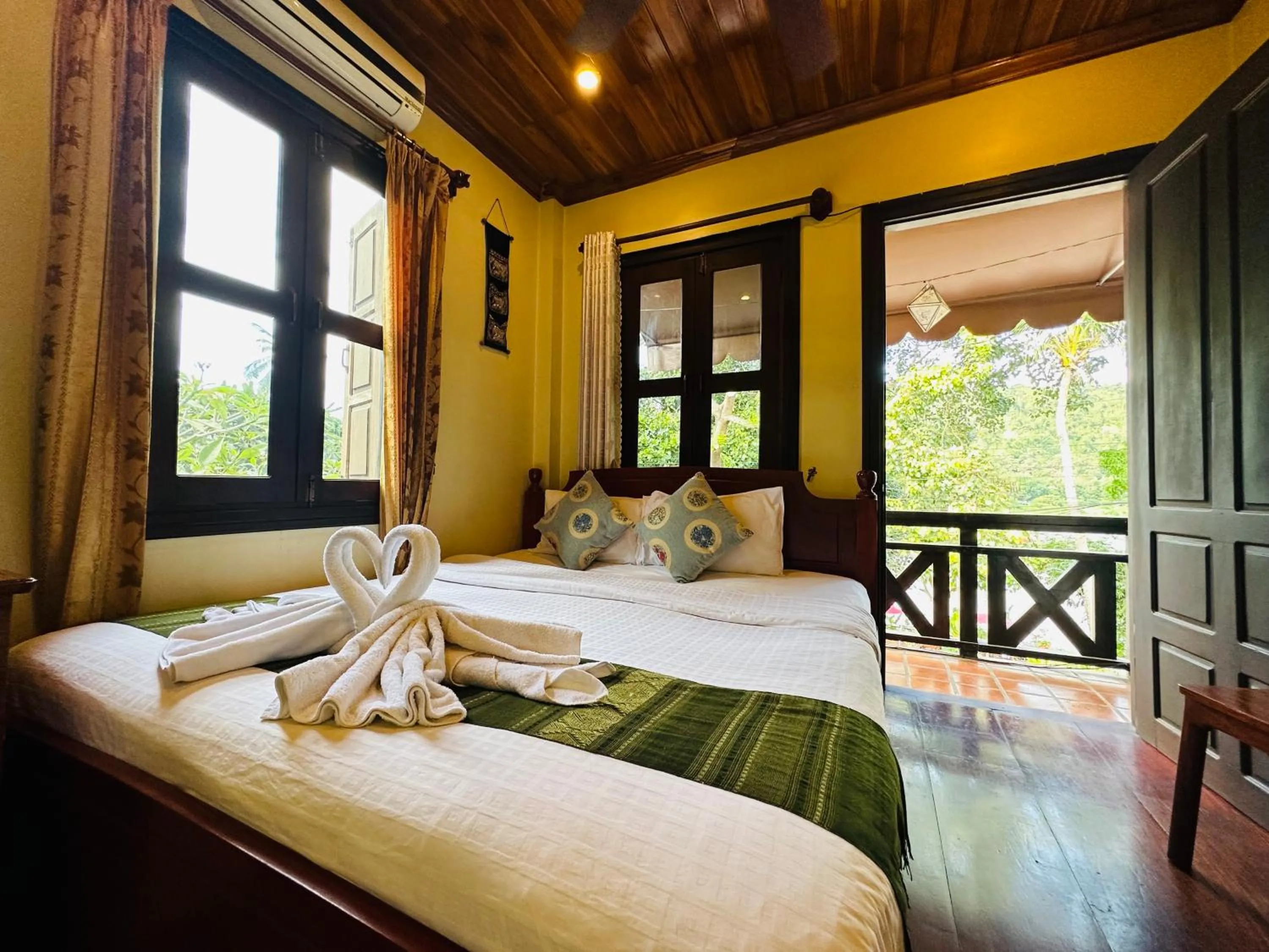 Living room, Bed in Anisa Mekong Riverside Villa