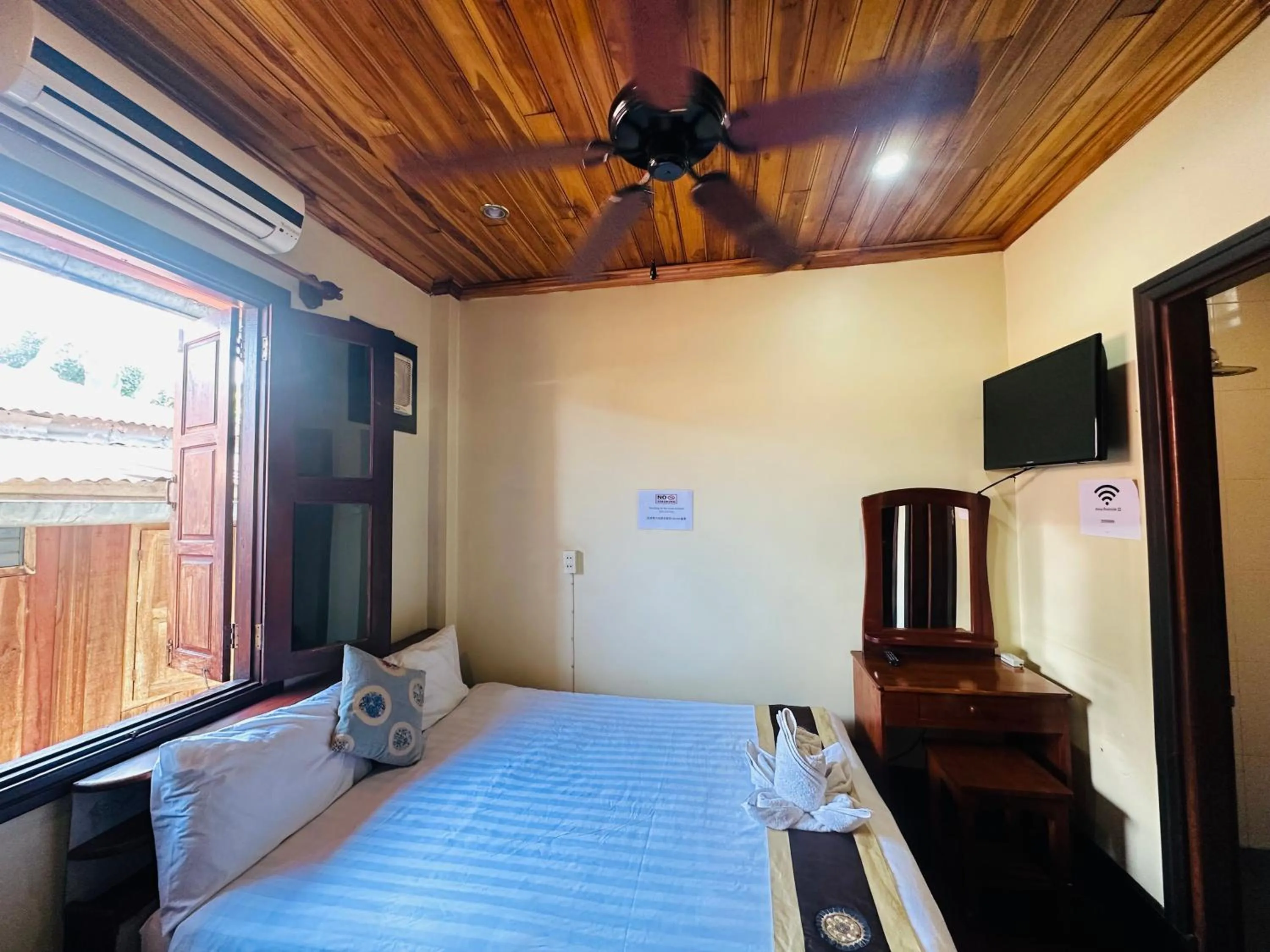 Bed in Anisa Mekong Riverside Villa