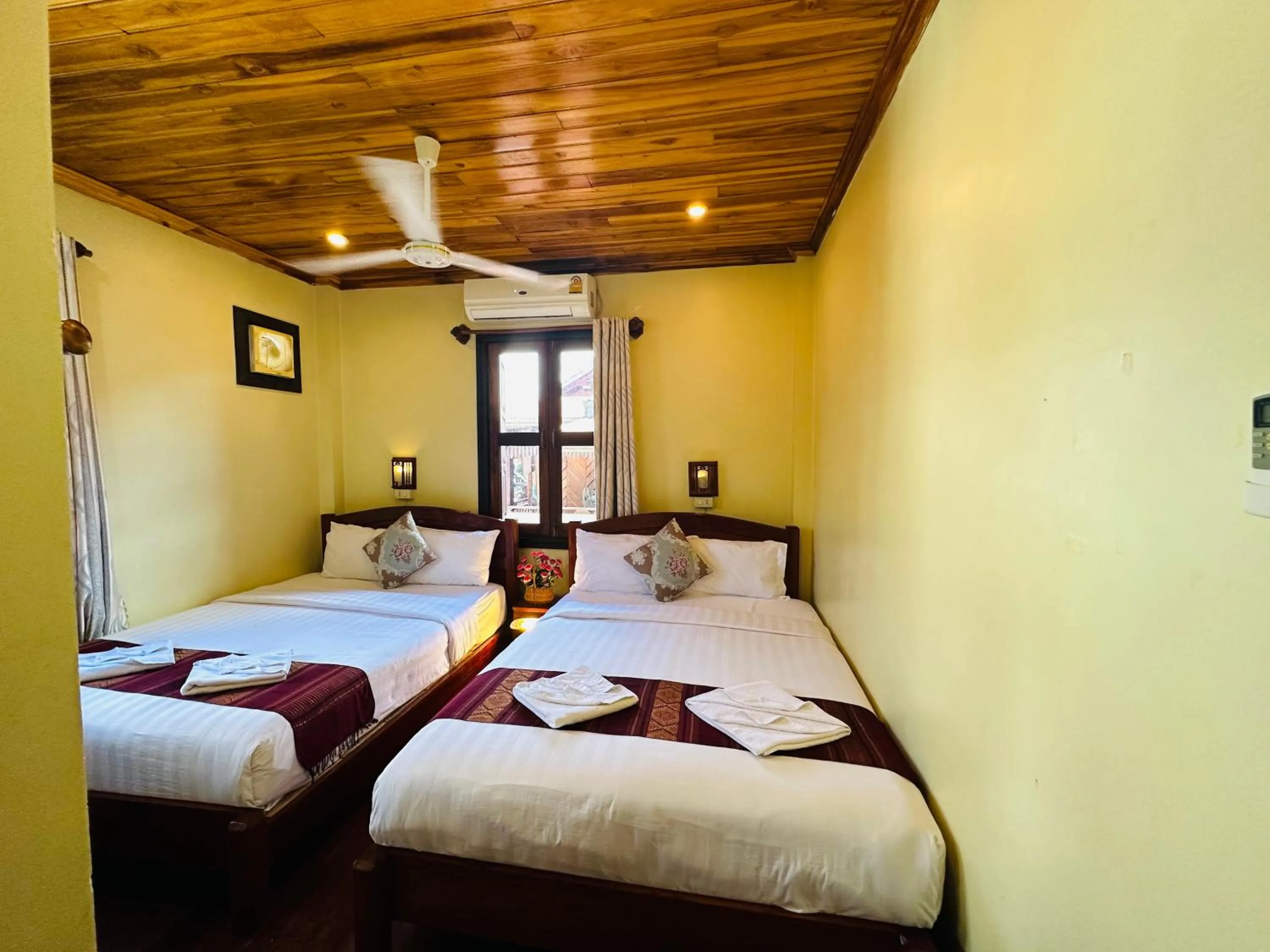 Bed in Anisa Mekong Riverside Villa