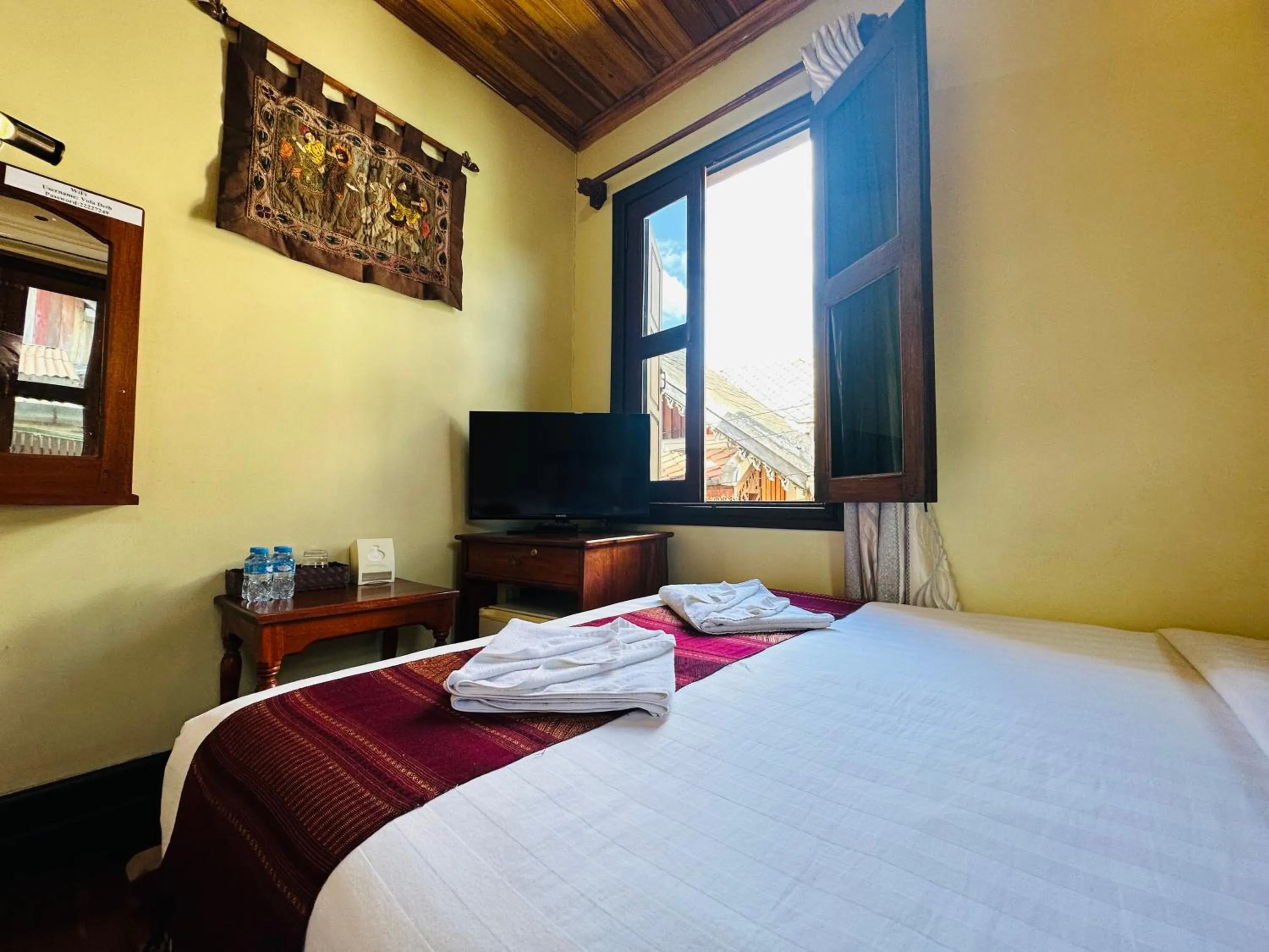 Communal lounge/ TV room, Bed in Anisa Mekong Riverside Villa