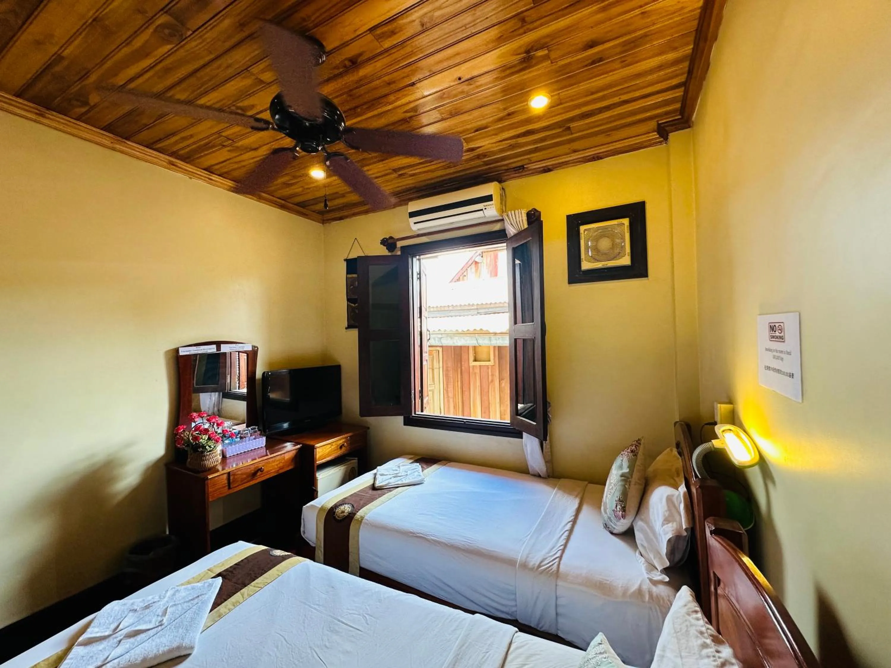 Communal lounge/ TV room, Bed in Anisa Mekong Riverside Villa