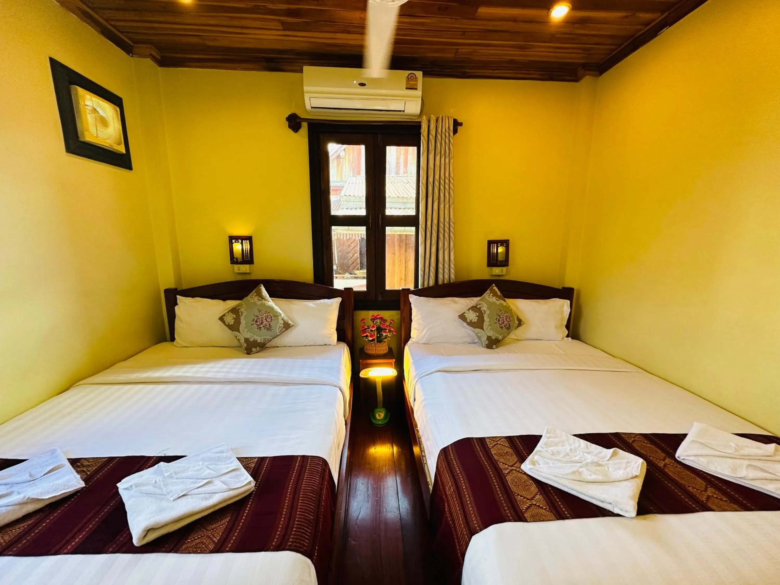 Bed in Anisa Mekong Riverside Villa