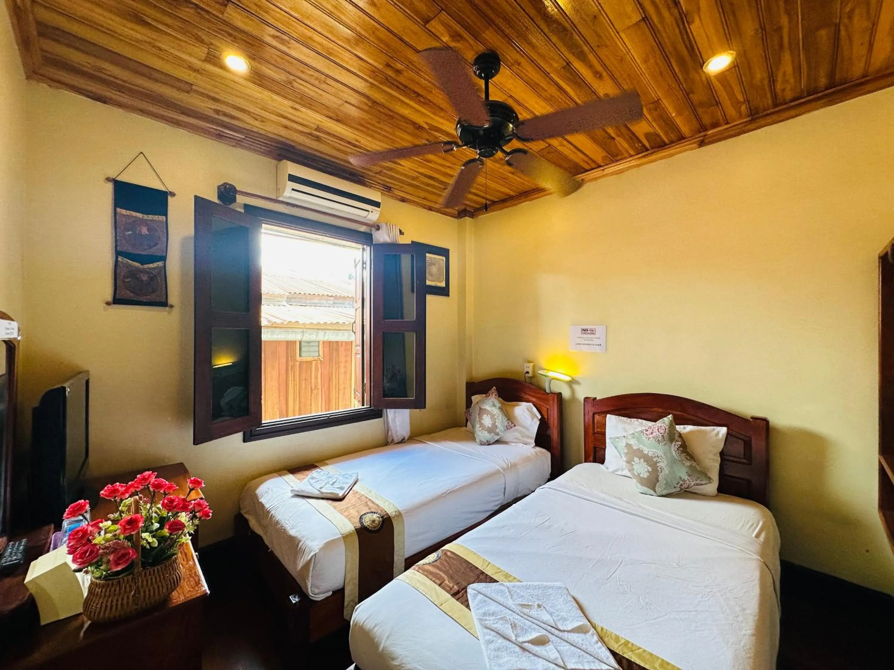 Bed in Anisa Mekong Riverside Villa