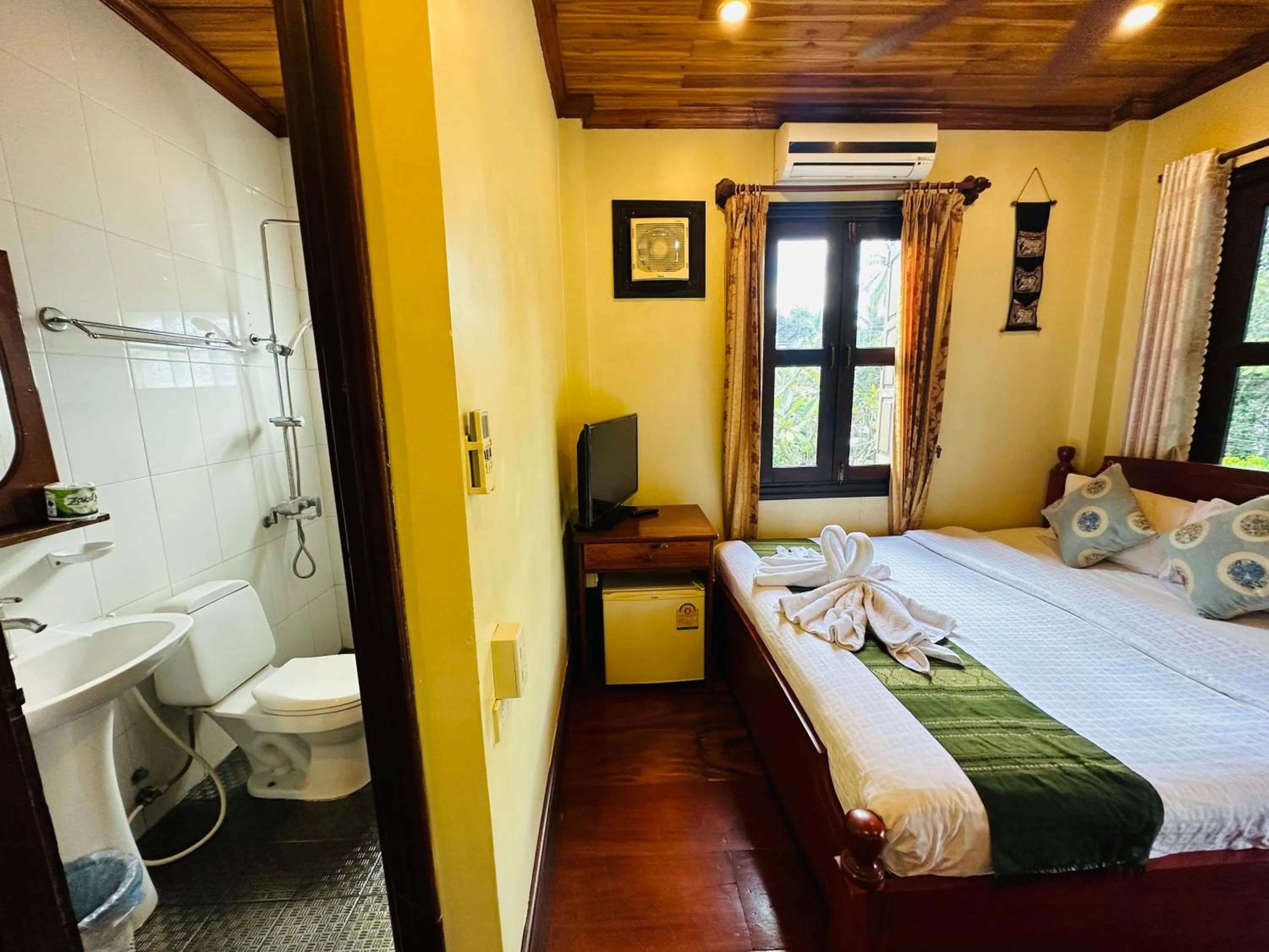 Toilet, Bed in Anisa Mekong Riverside Villa