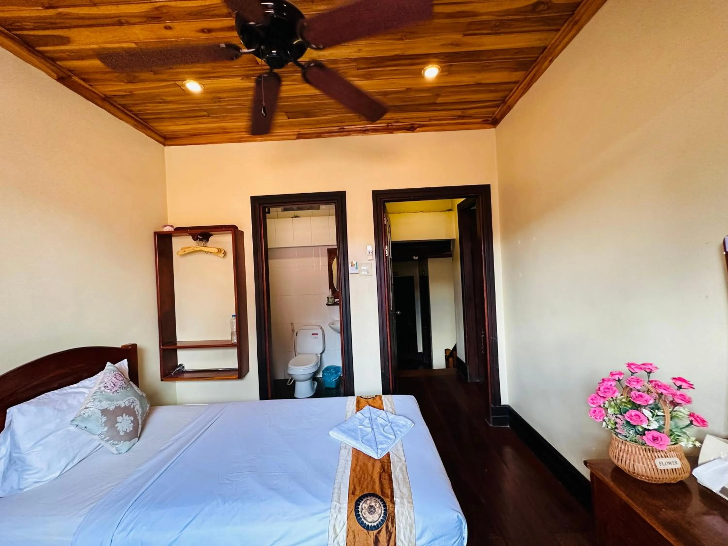 Bed in Anisa Mekong Riverside Villa