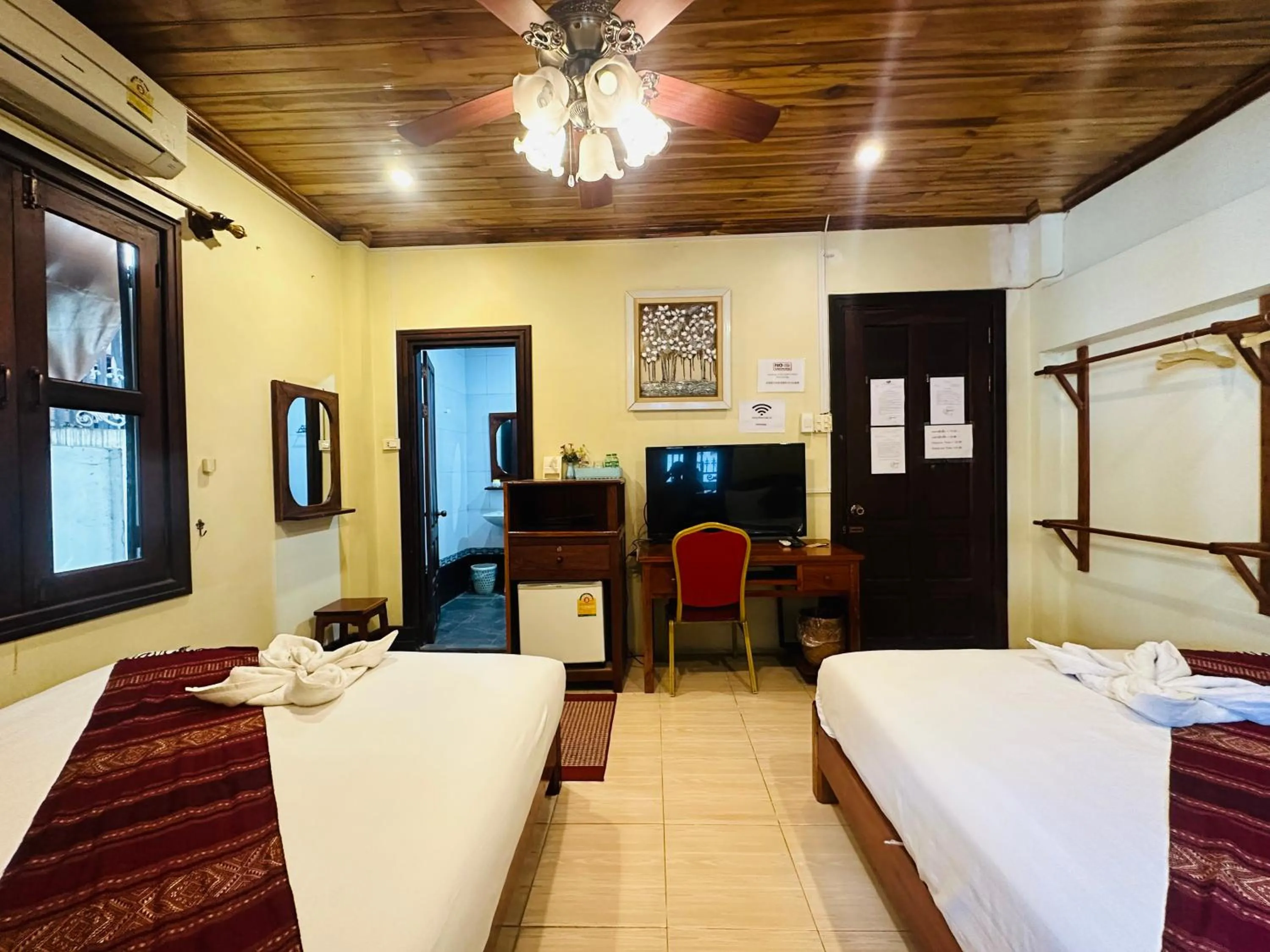 Bed in Anisa Mekong Riverside Villa